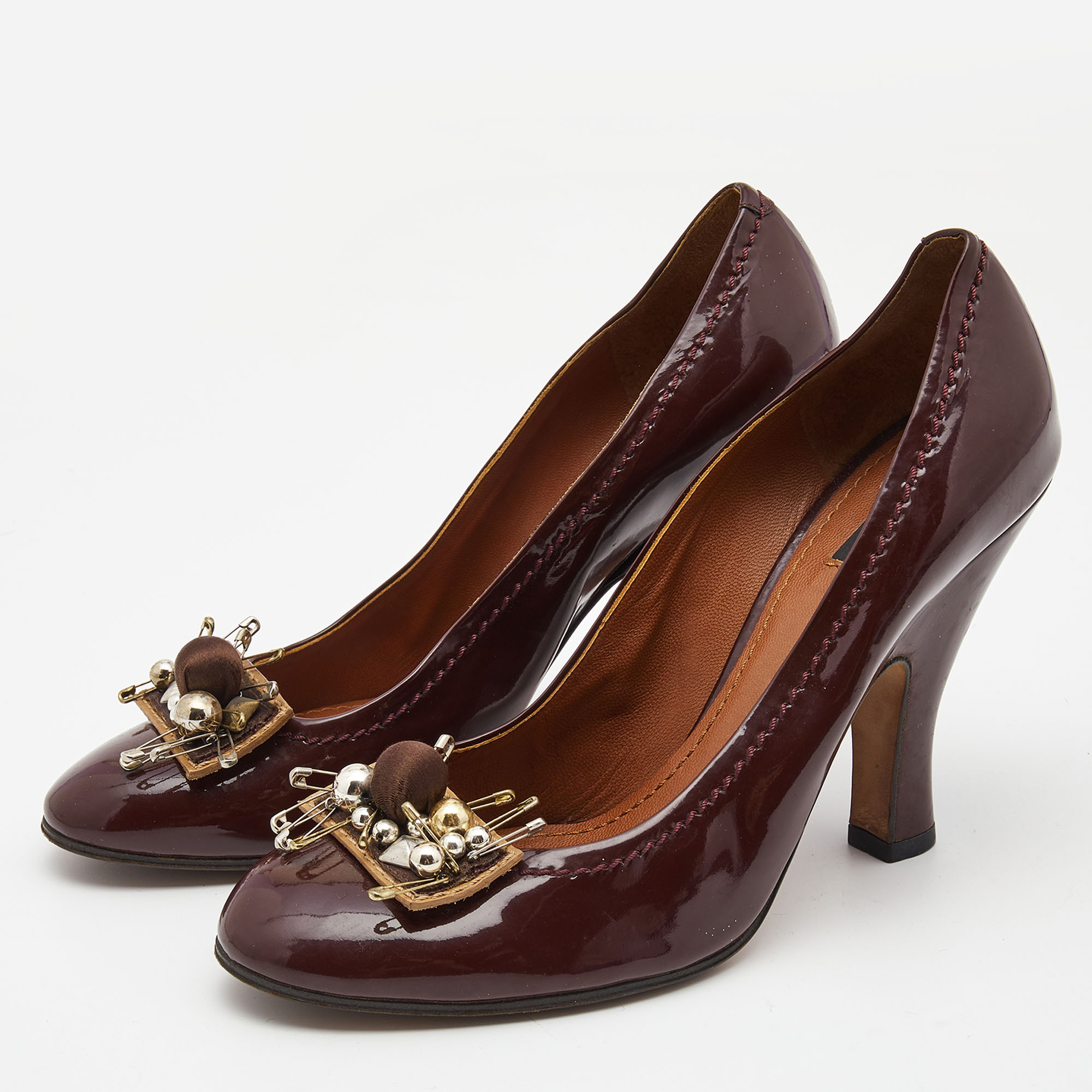 

Marc Jacobs Burgundy Patent Leather Embellished Pumps Size