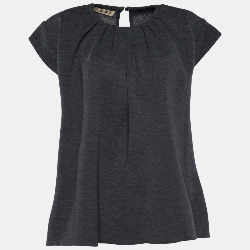 This top from Marni is the best pick for casual use. Stitched using grey wool knit fabric this top features a tie detail on the back short sleeves and a flared fit. Team it up with jeans to step out for errands or casual outings.