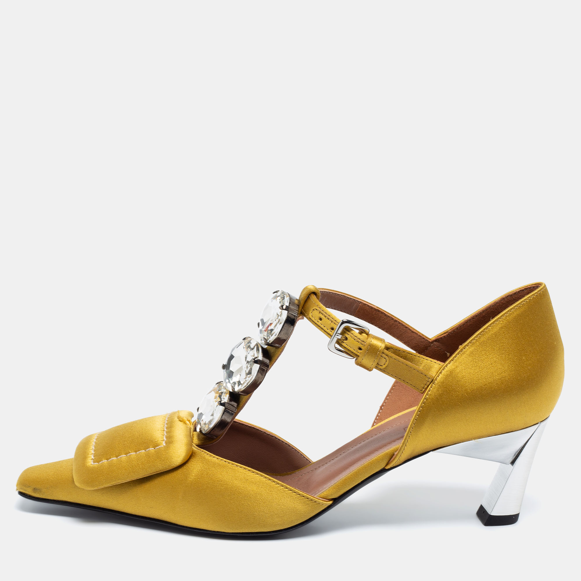 These pumps from the House of Marni will certainly make you look classy and polished They are created using yellow satin and display a crystal embellished T strap. They showcase 5.5 cm heels pointed toes and silver tone hardware. Look gorgeous as you wear these pumps