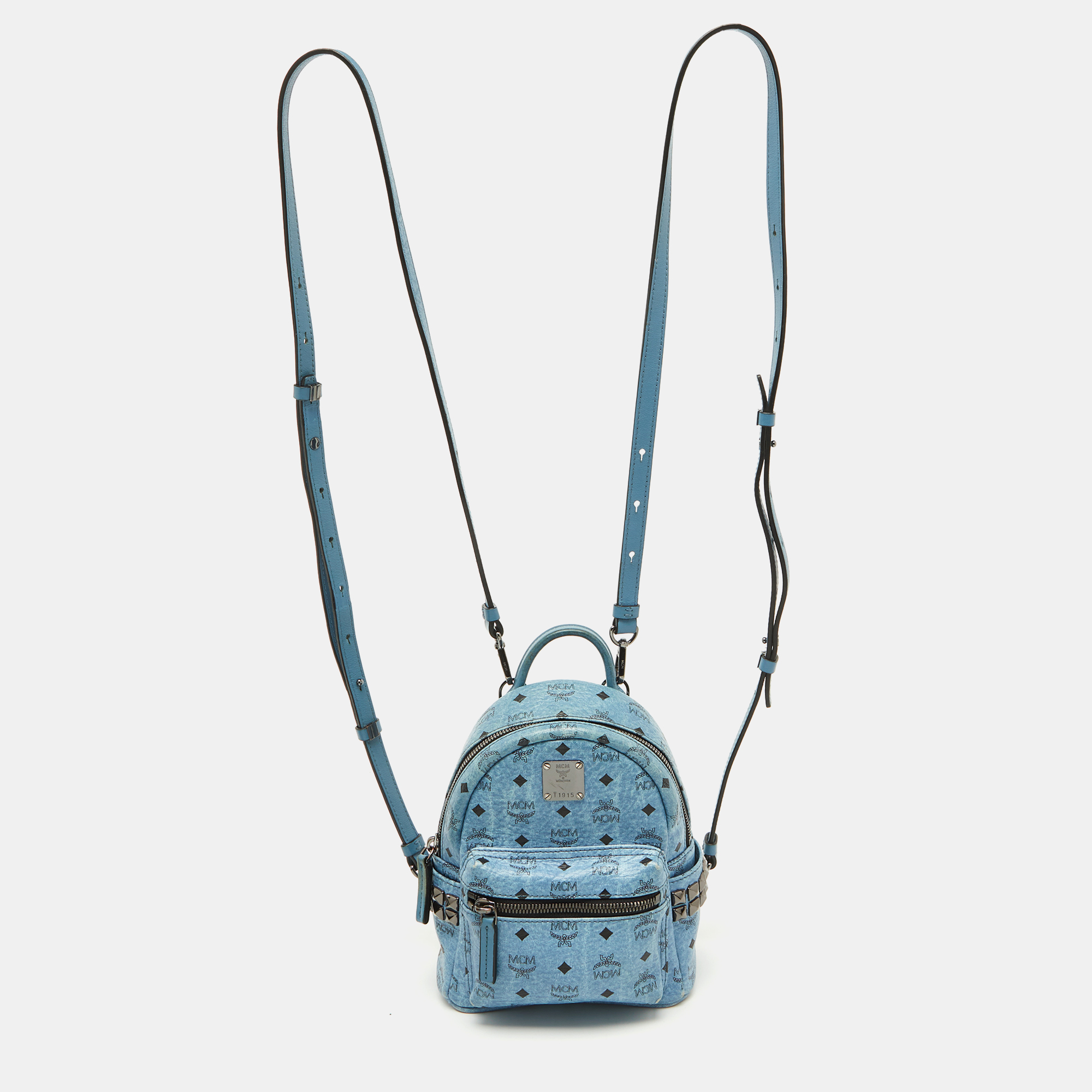 

MCM Blue Visetos Coated Canvas and Leather Side Stud X-Mini Stark Bebe Boo Backpack