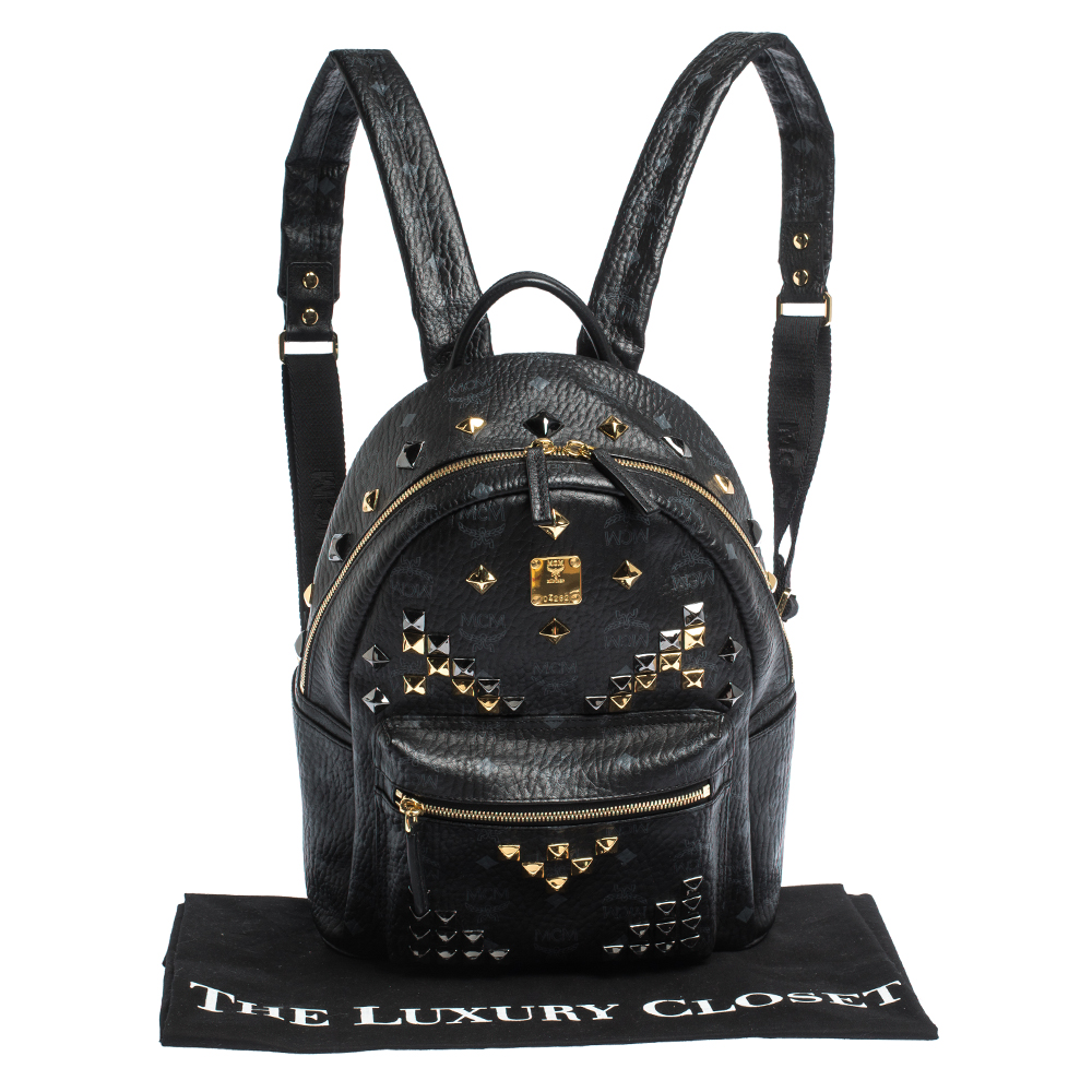 Sold at Auction: MCM Black Coated Canvas Studs Star Backpack, with gold and  silver hardware, the interior of the bag lined in black monogram nylon, w