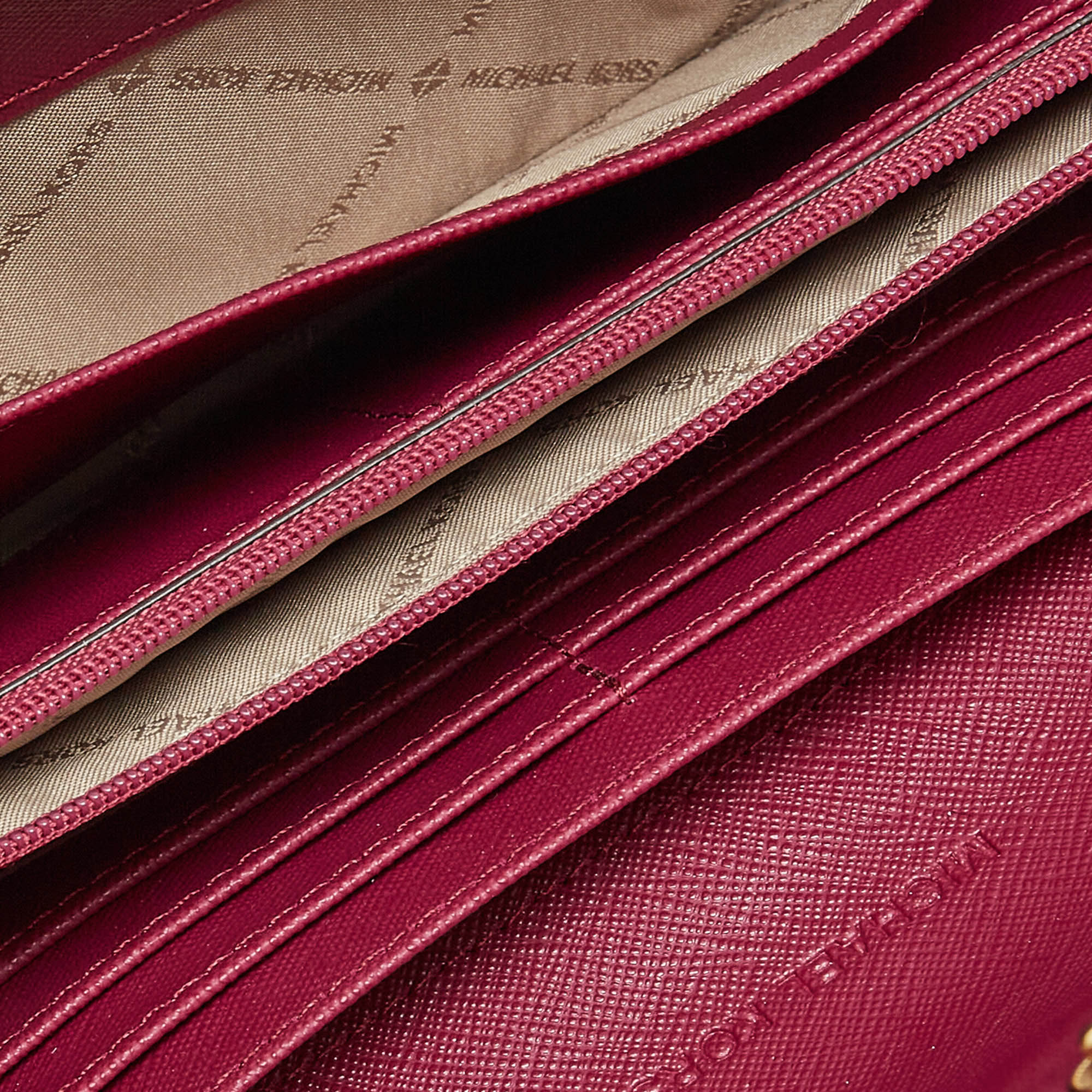 

Michael Kors Magenta Leather Jet Set Travel Carryall Wallet, Pink