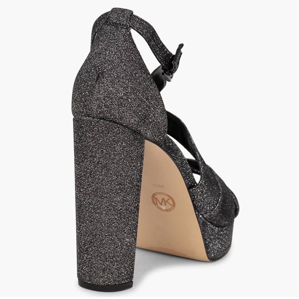 

Michael Kors Grey Leather Lorene Glitter Platform Sandals Size EU 39 (Available for UAE Customers only)