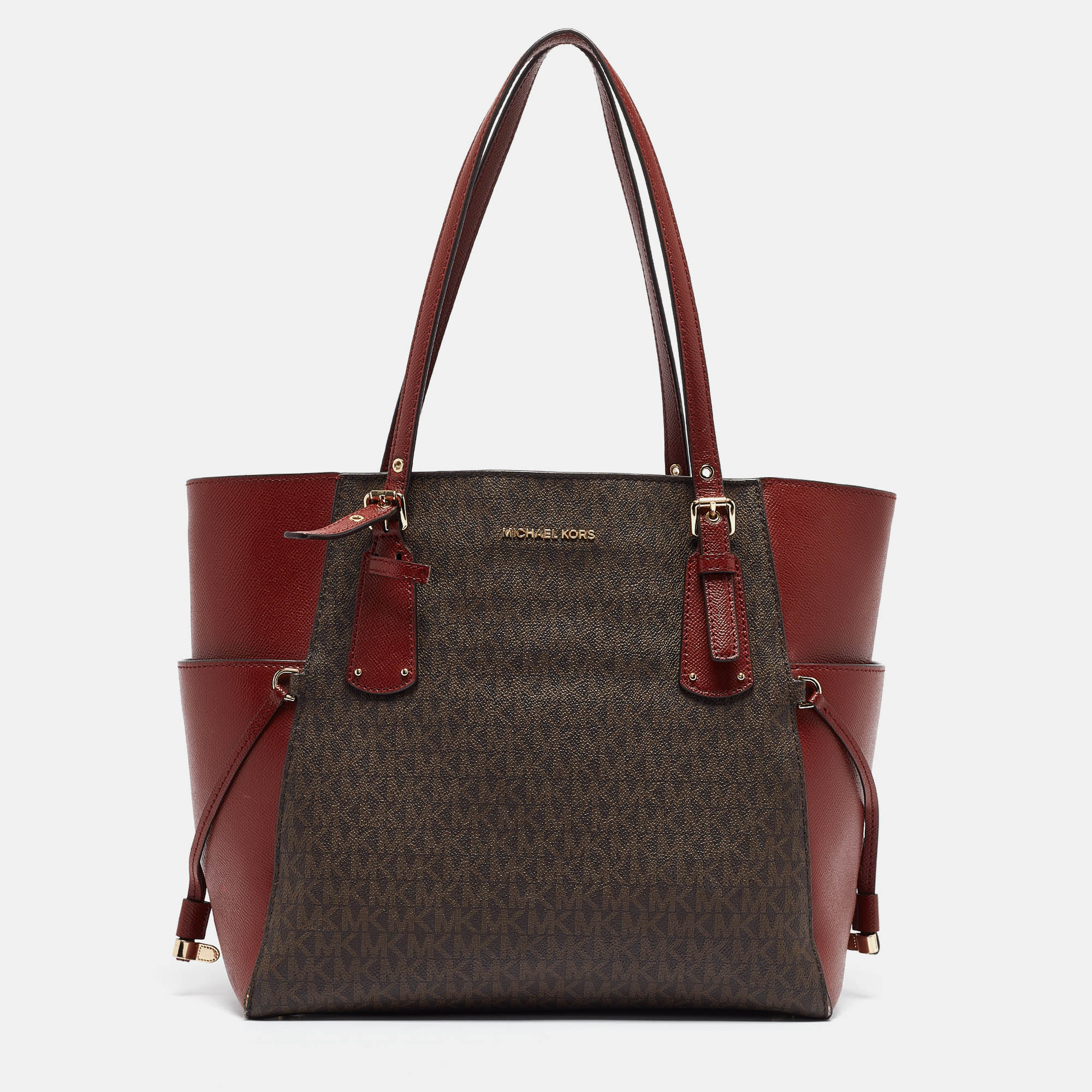 

Michael Kors Red/Brown Signature Coated Canvas and Leather Voyager East West Tote