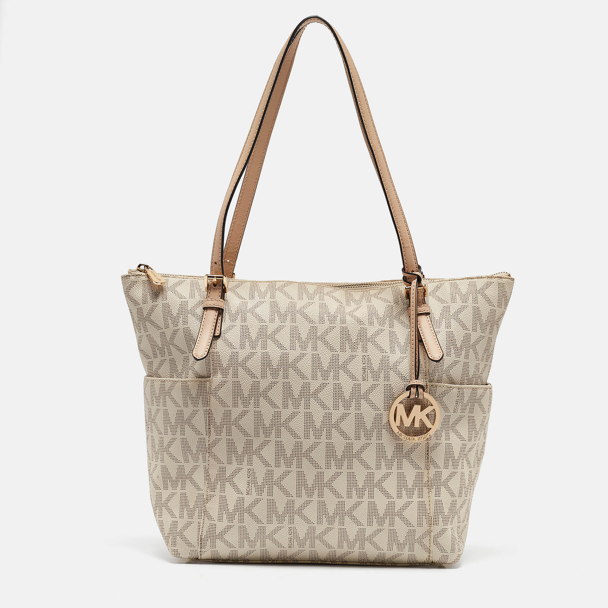 

Michael Kors Off White/Beige Signature Coated Canvas and Leather Jet Set Top Zip Tote