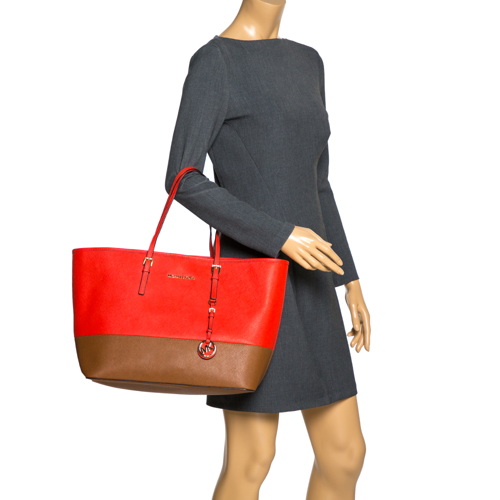 

MICHAEL Michael Kors Orange/Brown Leather Jet Set Travel Tote