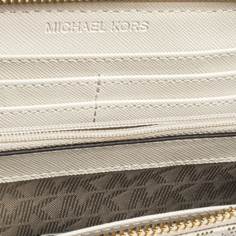 

Michael Kors White Monogram Coated Canvas Zip Around Wallet
