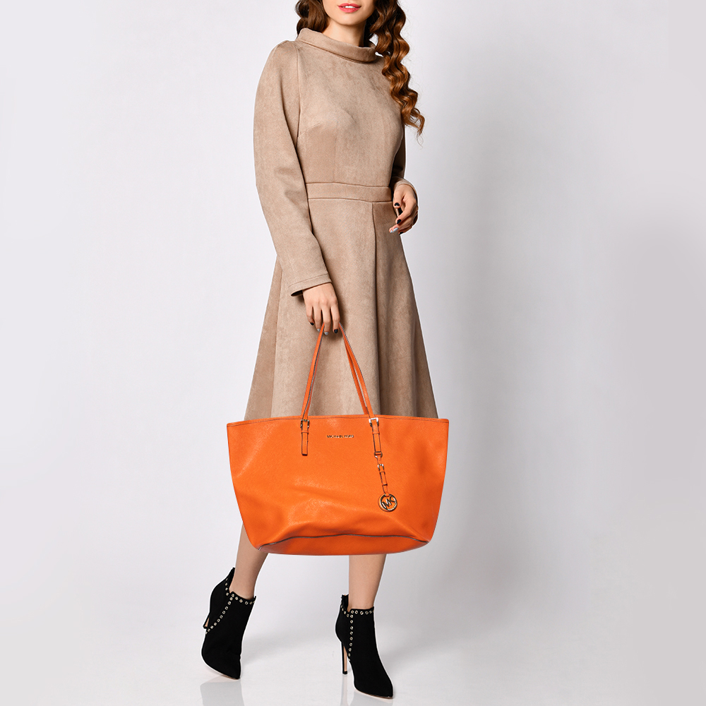

Michael Kors Orange Leather Large Jet Set Travel Tote