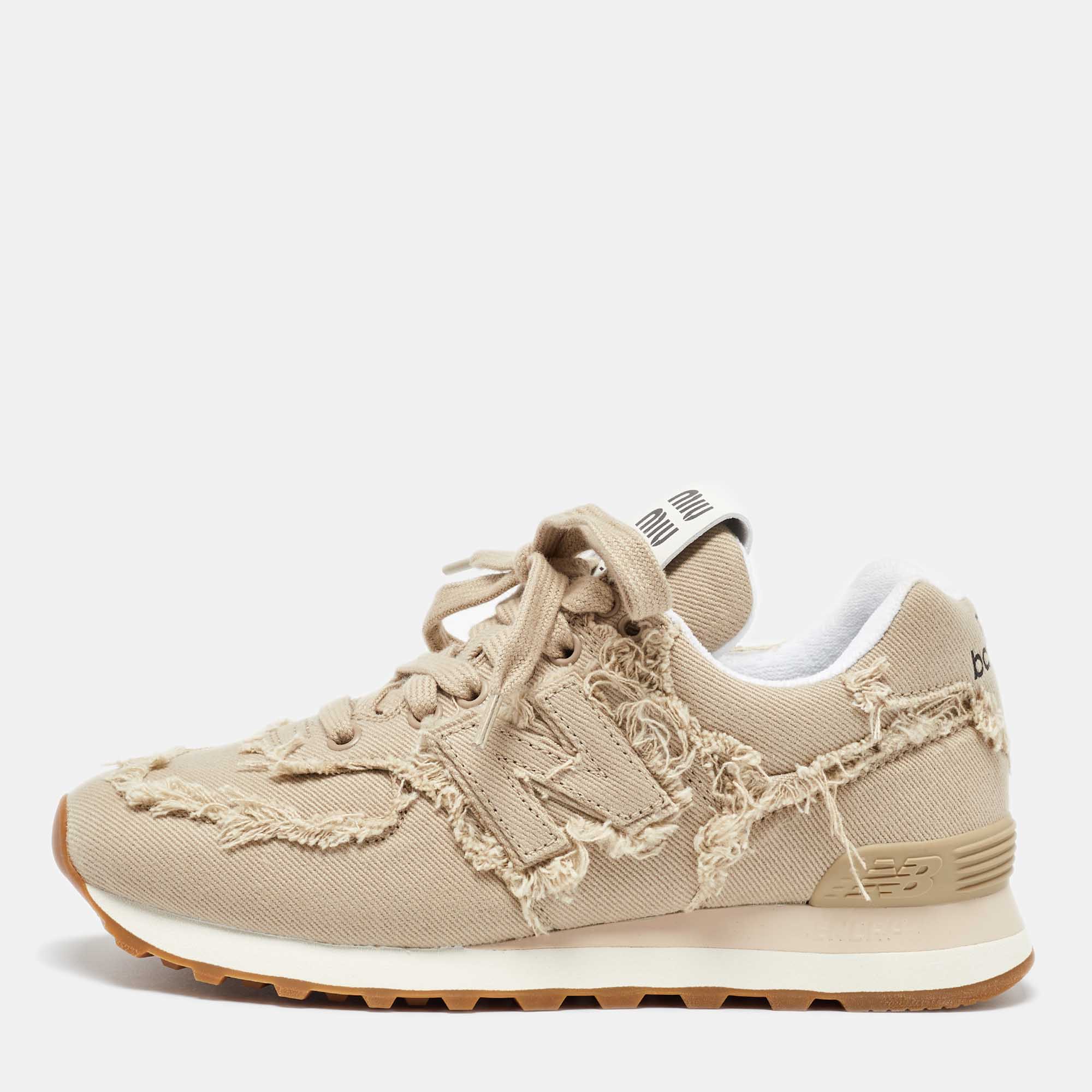 

Miu Miu x New Balance Beige Canvas Lace Up Sneakers Size