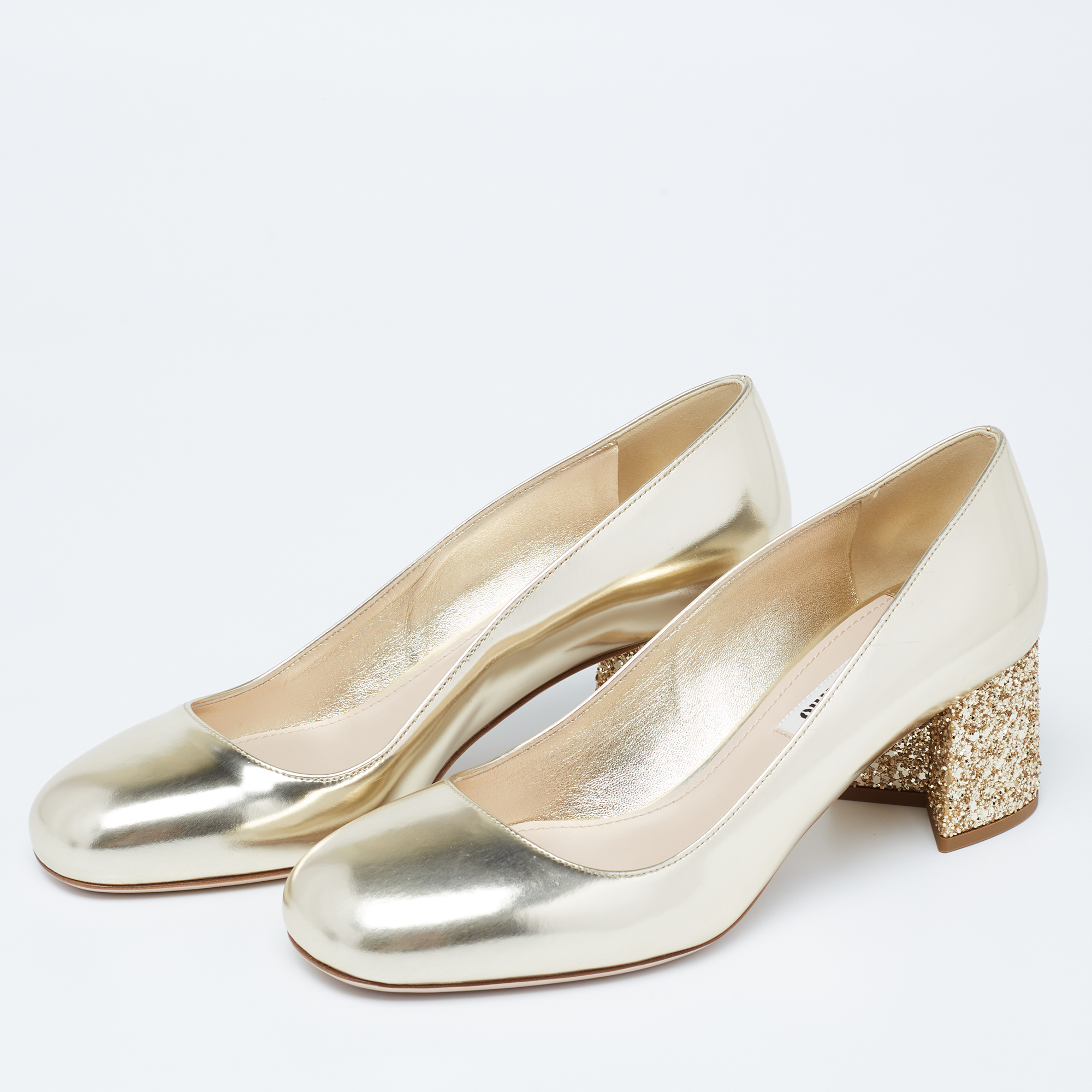 

Miu Miu Dull Gold Patent Leather Glitter Heel Round-Toe Pumps Size