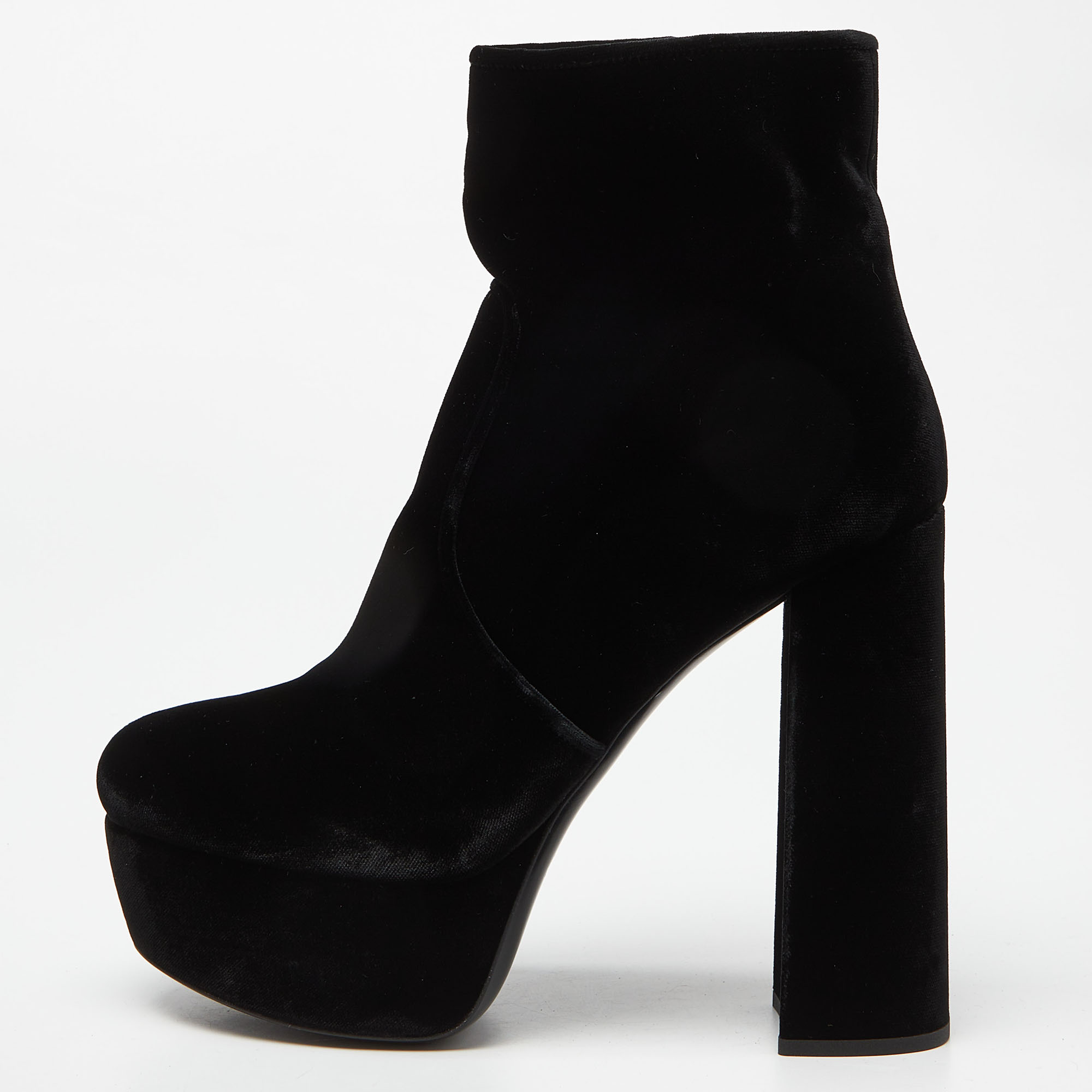 A perfect pair of stylish and effortlessly statement shoes that will last you through seasons and occasions these Miu Miu boots are a must have in your collection. Crafted in black velvet these ankle boots feature block heels which makes it perfect to wear longer hours. It is complete with zippers and comfortable insoles.