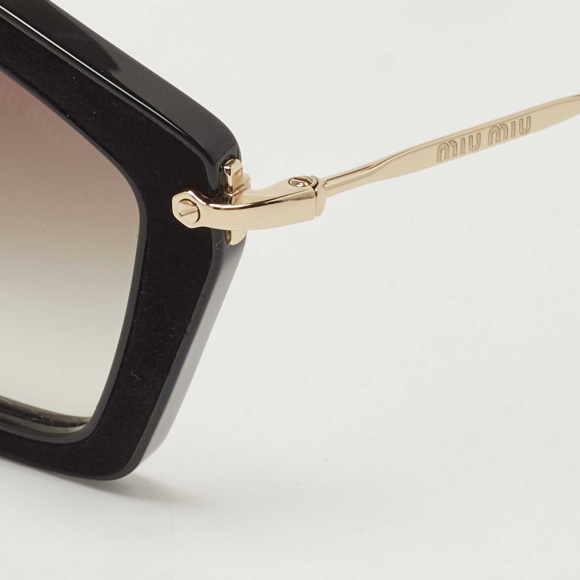

Miu Miu Black/Gold Gradient Cat Eye Sunglasses