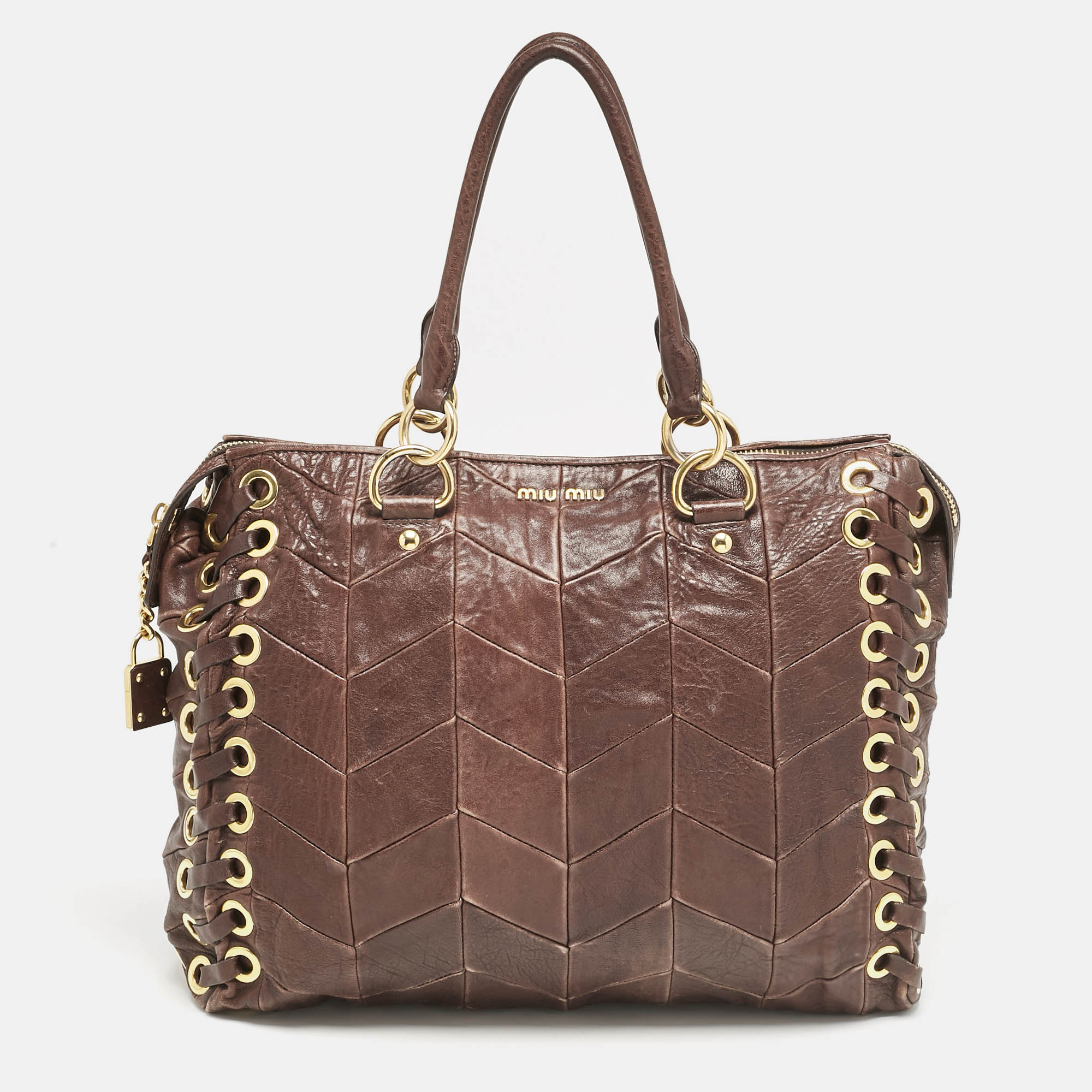 

Miu Miu Brown Matelasse Leather Grommet Tote