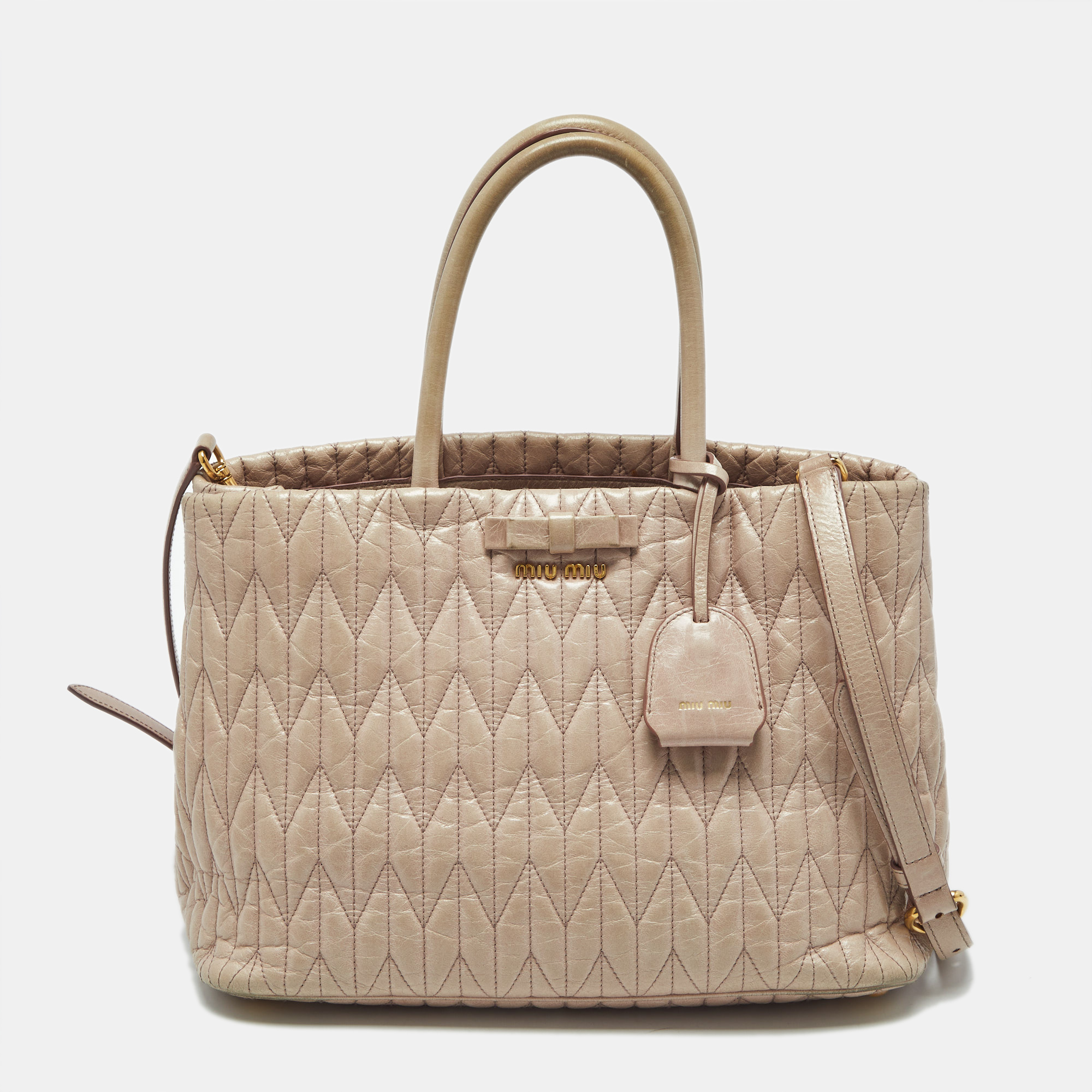 

Miu Miu Light Pink Matelasse Leather Bow Tote