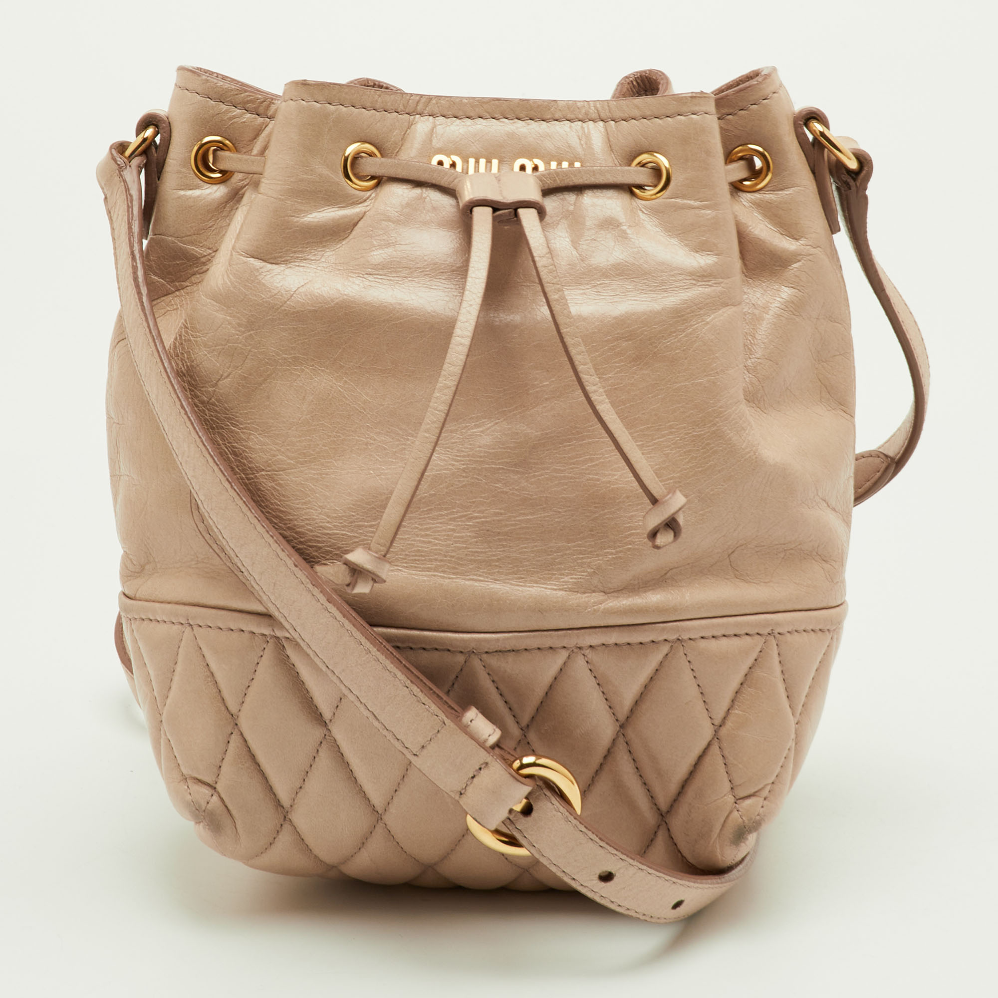 

Miu Miu Beige Vitello Shine Leather Drawstring Bucket Bag