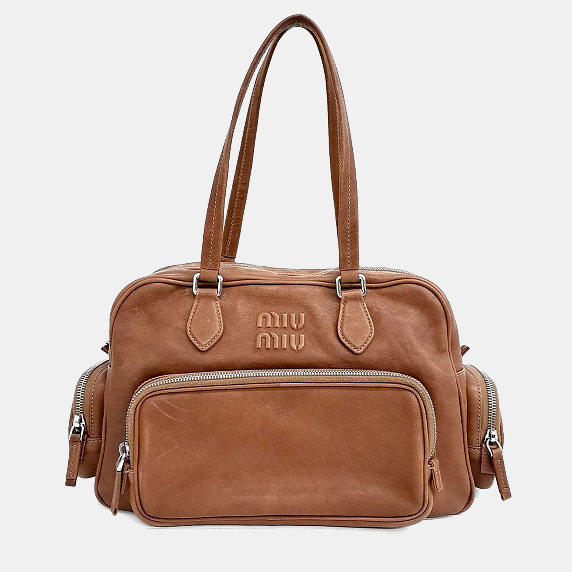 

Miu Miu Brown Leather Napa Top Handle Pocket Bag