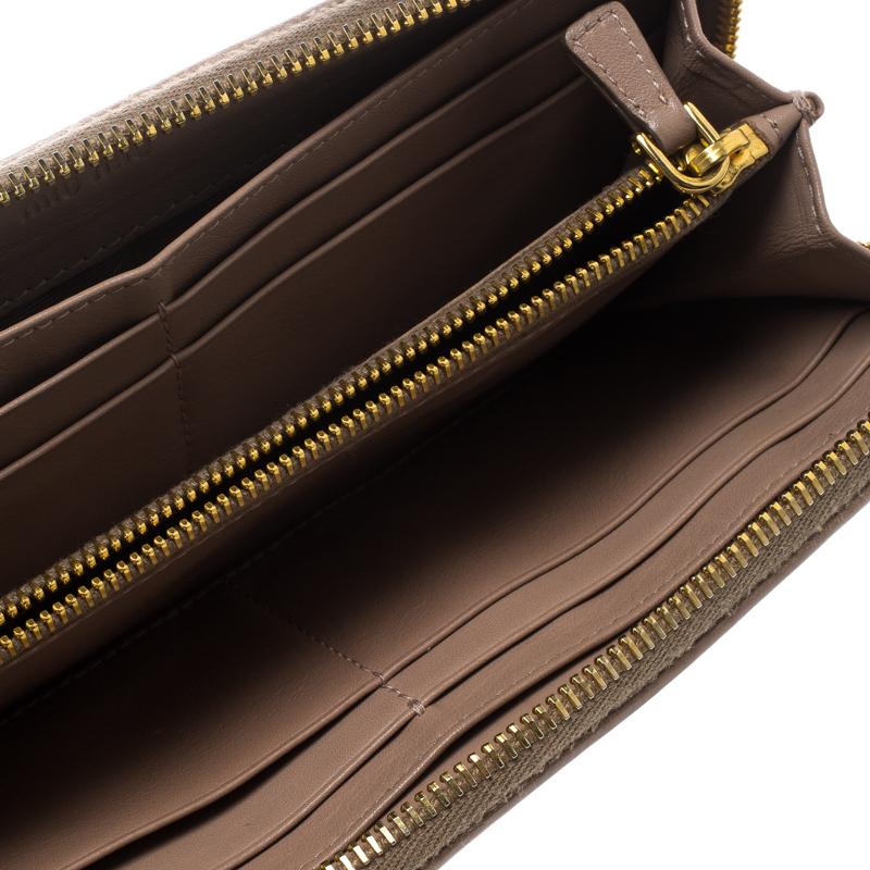 

Miu Miu Beige Leather Studded Zip Wallet