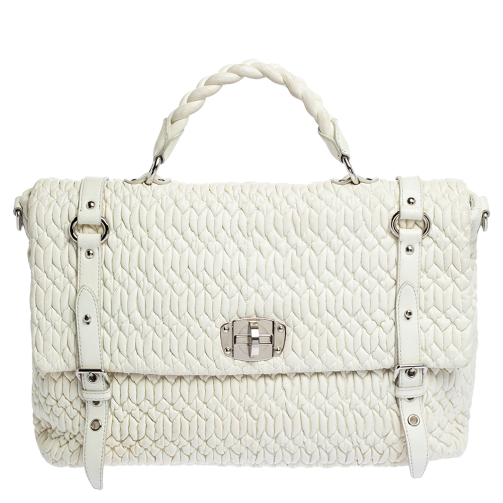 Click to view more detailed imagery on our partner's website Pre-owned Miu Miu White Matelasse Nappa Leather Turnlock Top Handle Bag