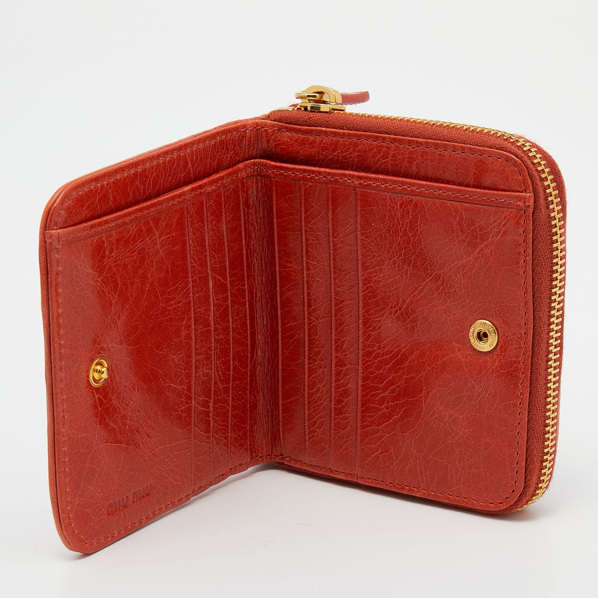 

Miu Miu Orange Matelassé Leather Zip Around Compact Wallet