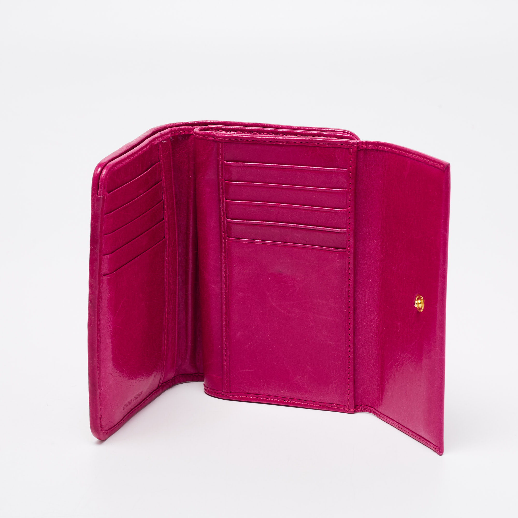 

Miu Miu Fuchsia Matelasse Leather Flap Compact Wallet, Pink