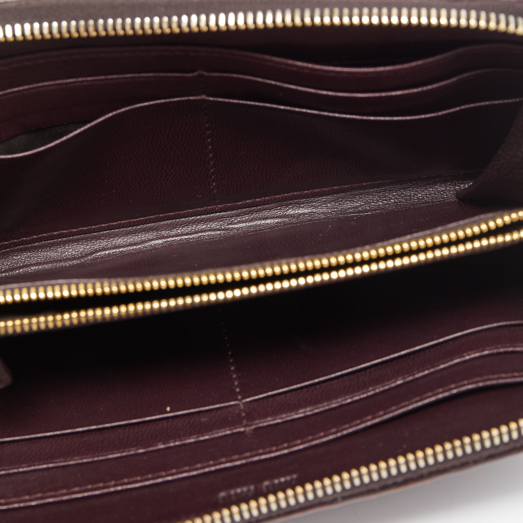 

Miu Miu Burgundy Matelassé Leather Zip Around Wallet