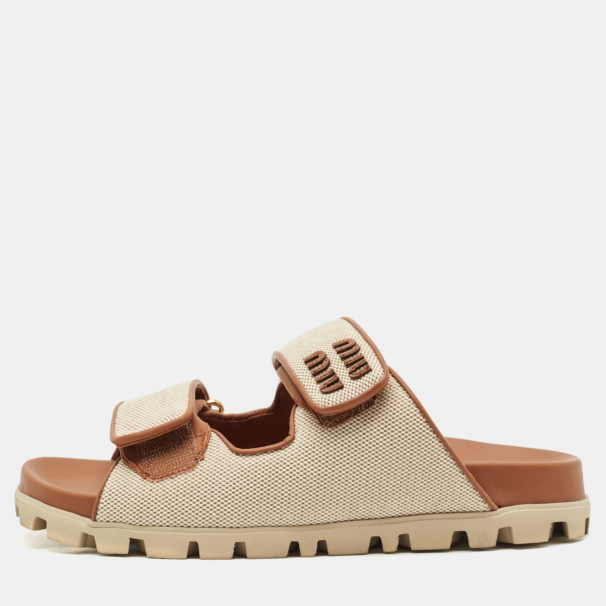 

Miu Miu Beige/Brown Canvas and Leather Neutral Mules Size