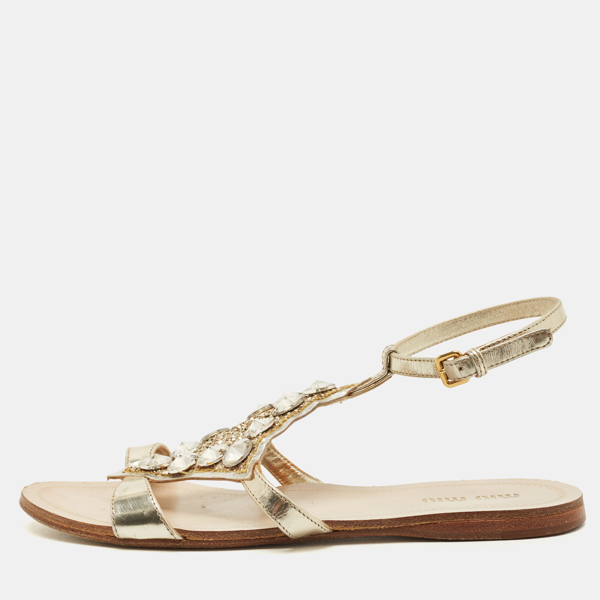 Click to view more detailed imagery on our partner's website Pre-owned Miu Miu Size 35 Silver Foil Leather Crystal Embellished Ankle Strap Flat Sandals