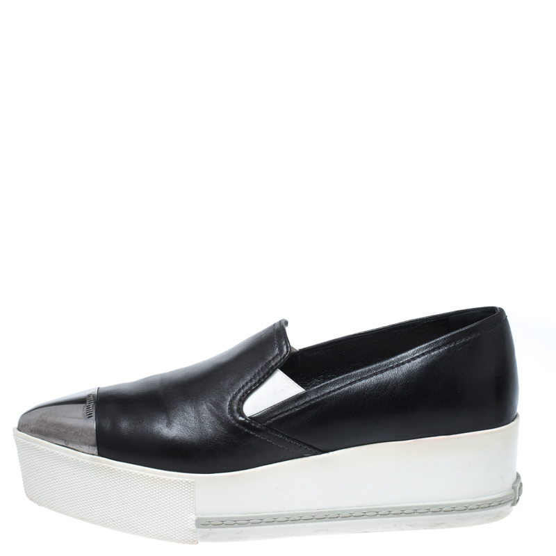 

Miu Miu Black Leather Metal Cap Toe Slip On Sneakers Size