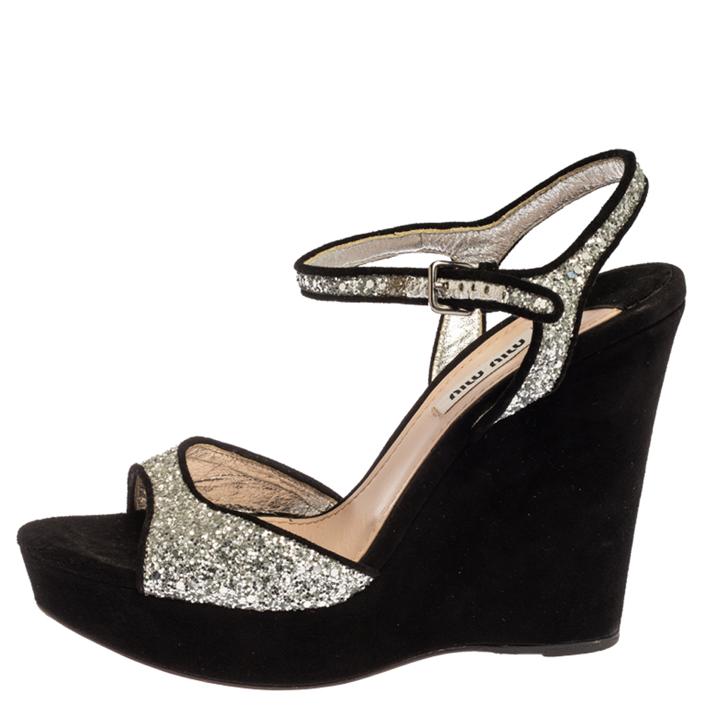 

Miu Miu Black/Silver Coarse Glitter And Suede Open Toe Ankle Strap Wedge Sandals Size