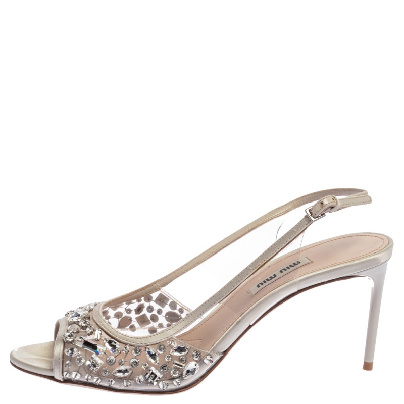 

Miu Miu White PVC And Leather Crystal Embellished Slingback Sandals Size
