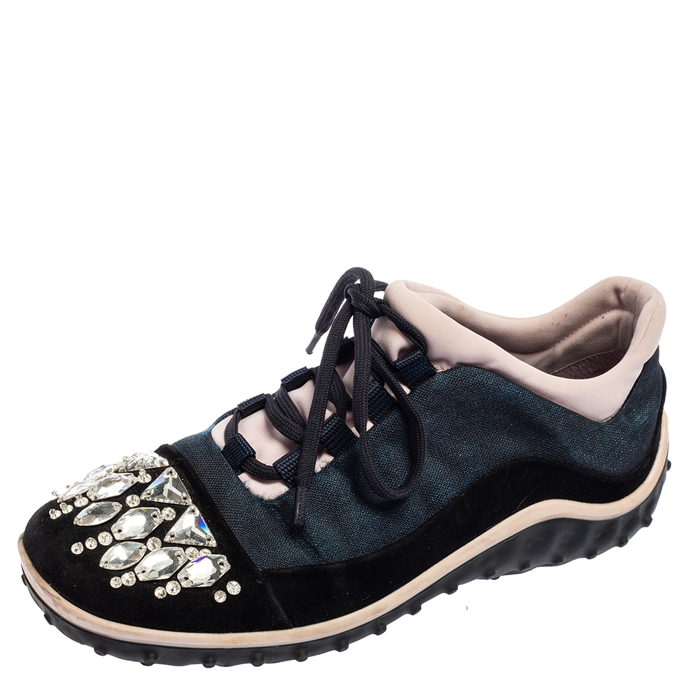 These sneakers from Miu Miu are so smart youll love wearing them for your special outings They are crafted from fabric and feature suede trims crystal embellishments on the cap toes lace ups on the vamps comfortable insoles and tough rubber soles.