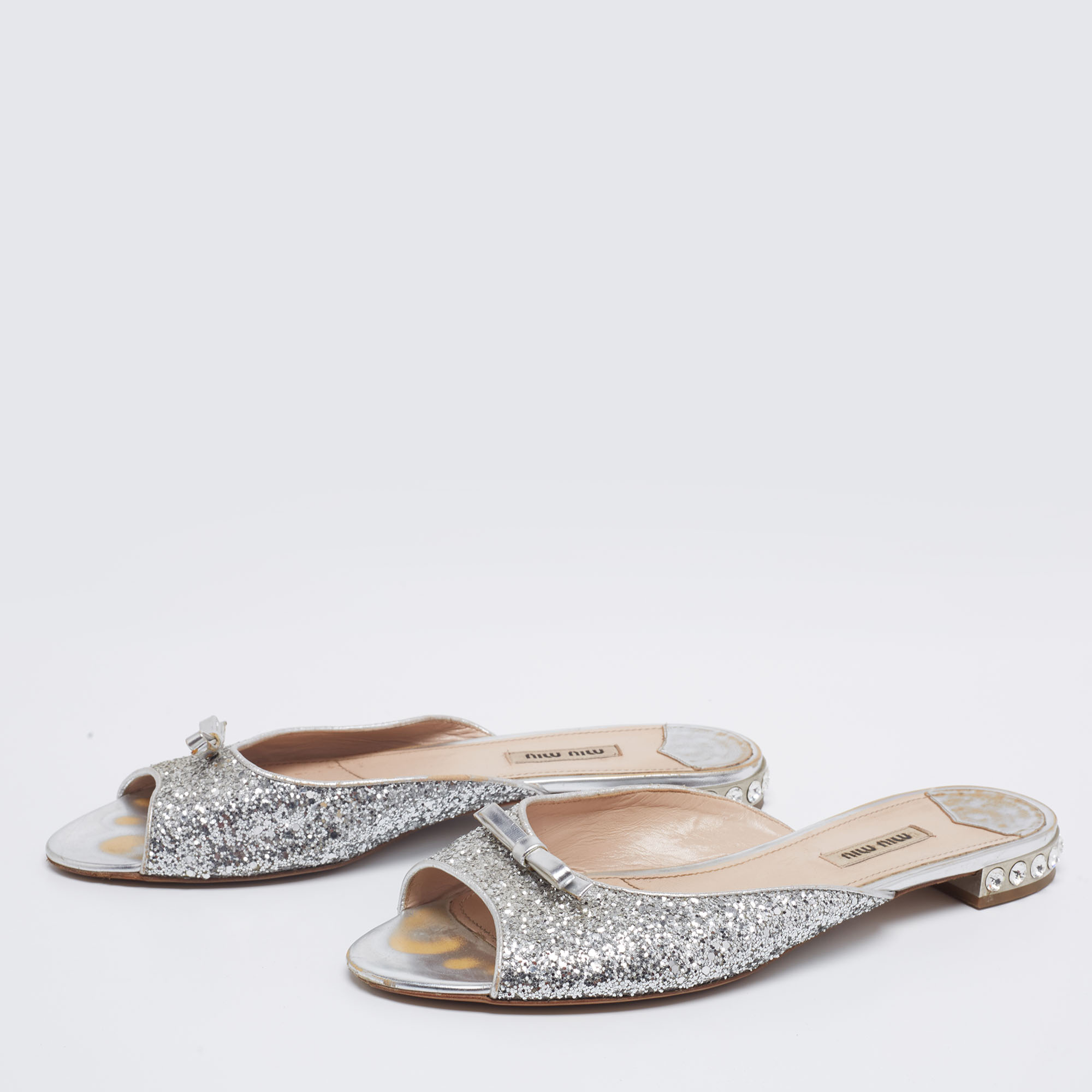 

Miu Miu Silver Coarse Glitter Embellished Slide Sandals Size