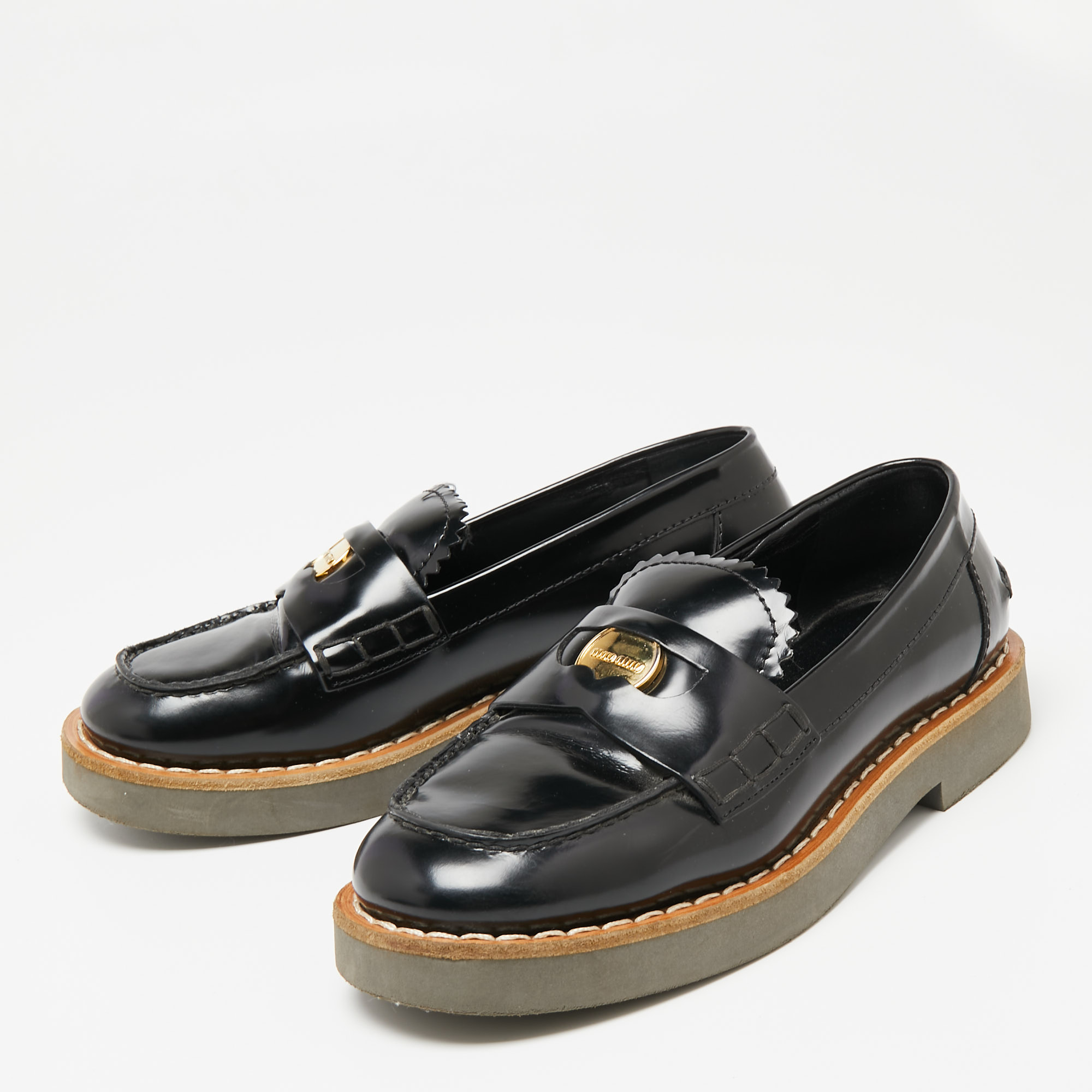 

Miu Miu Black Leather Slip On Loafers Size
