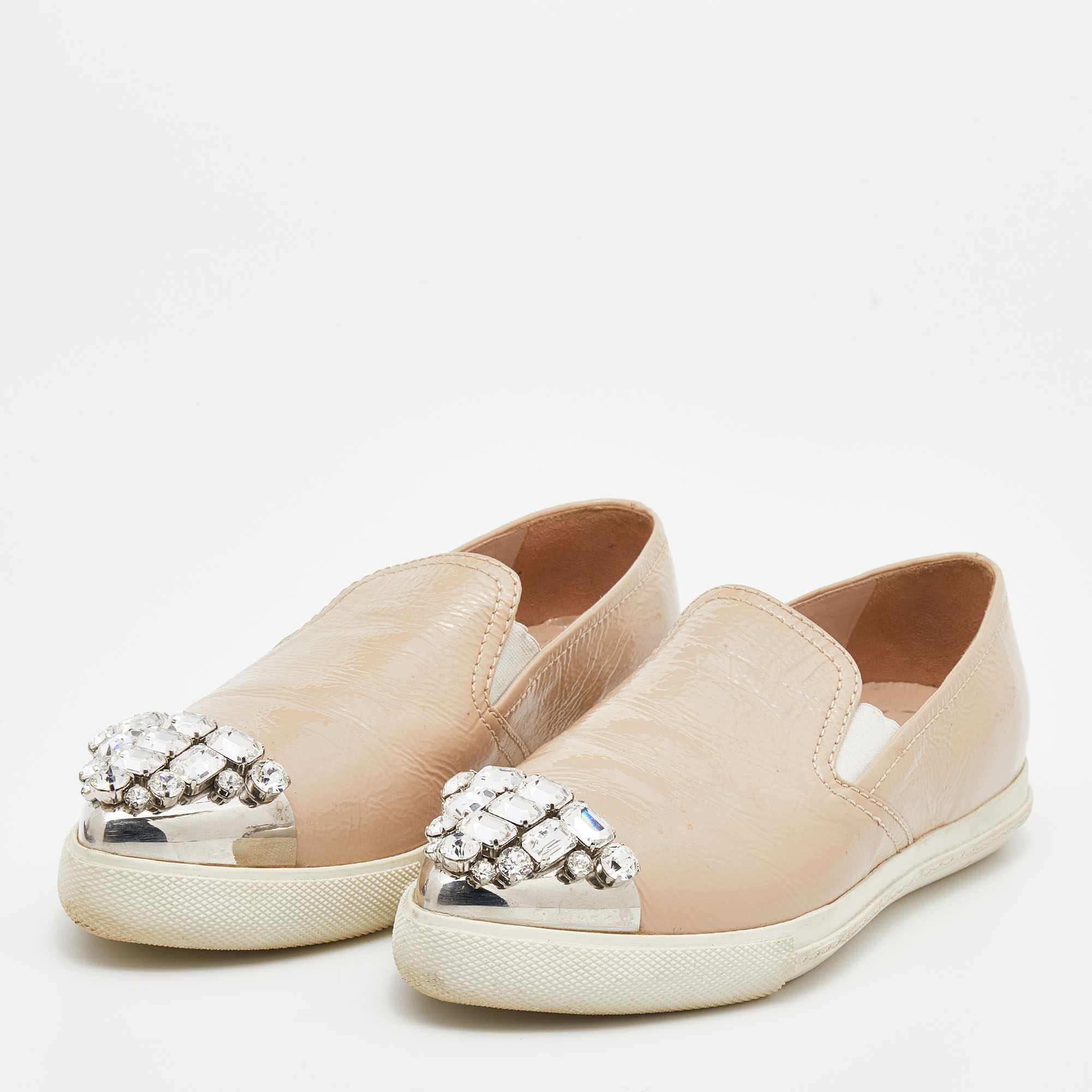 

Miu Miu Beige Patent Leather Crystal Embellished Cap Toe Slip On Sneakers Size