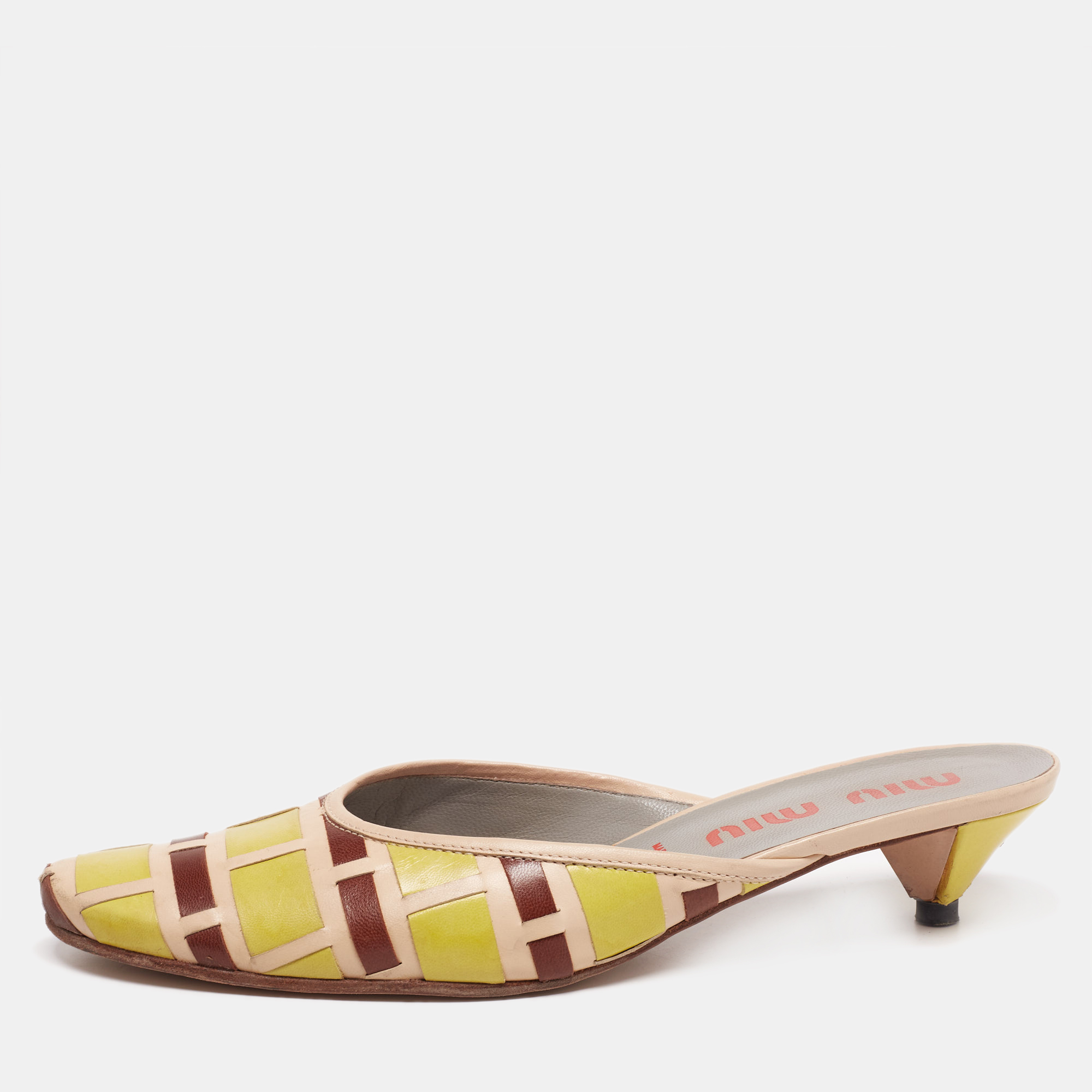 These Miu Miu sandals are designed to offer you comfort without compromising on style. Crafted from tricolor woven leather they flaunt 5cm heels a sleek silhouette and a slip on fitting.