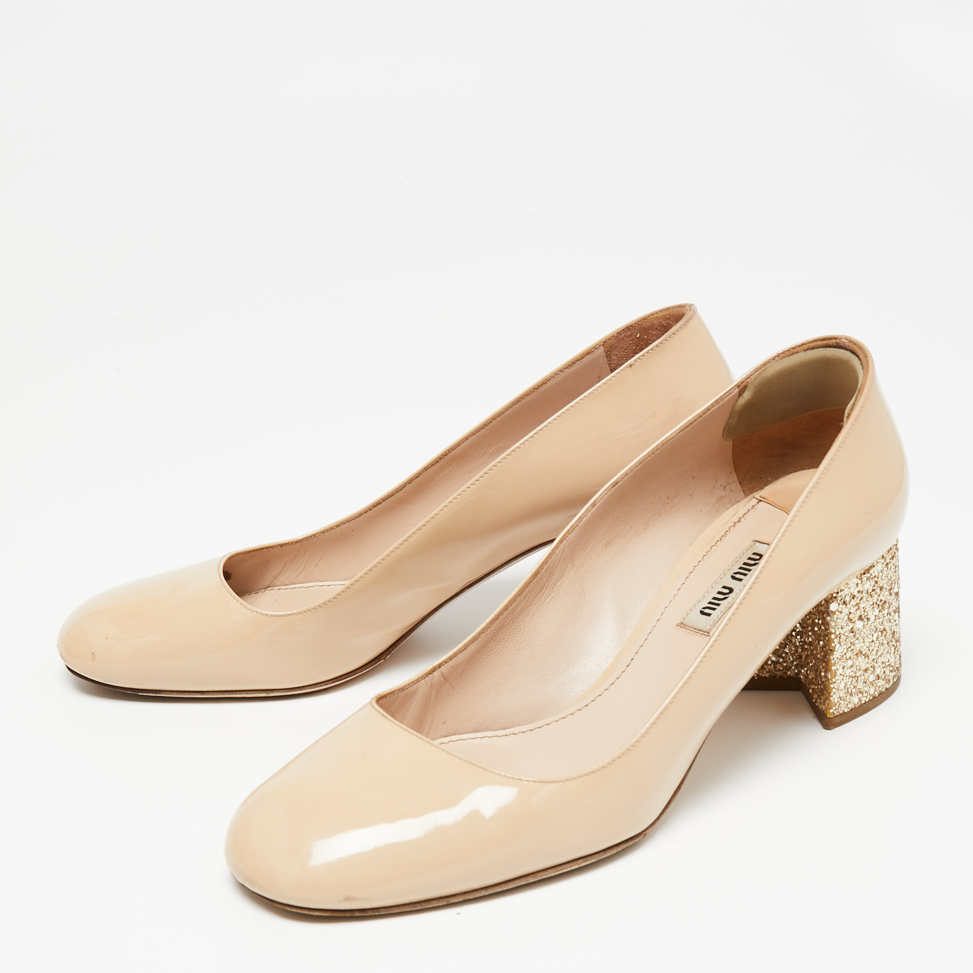 

Miu Miu Beige Patent Leather Glitter Heel Pumps Size