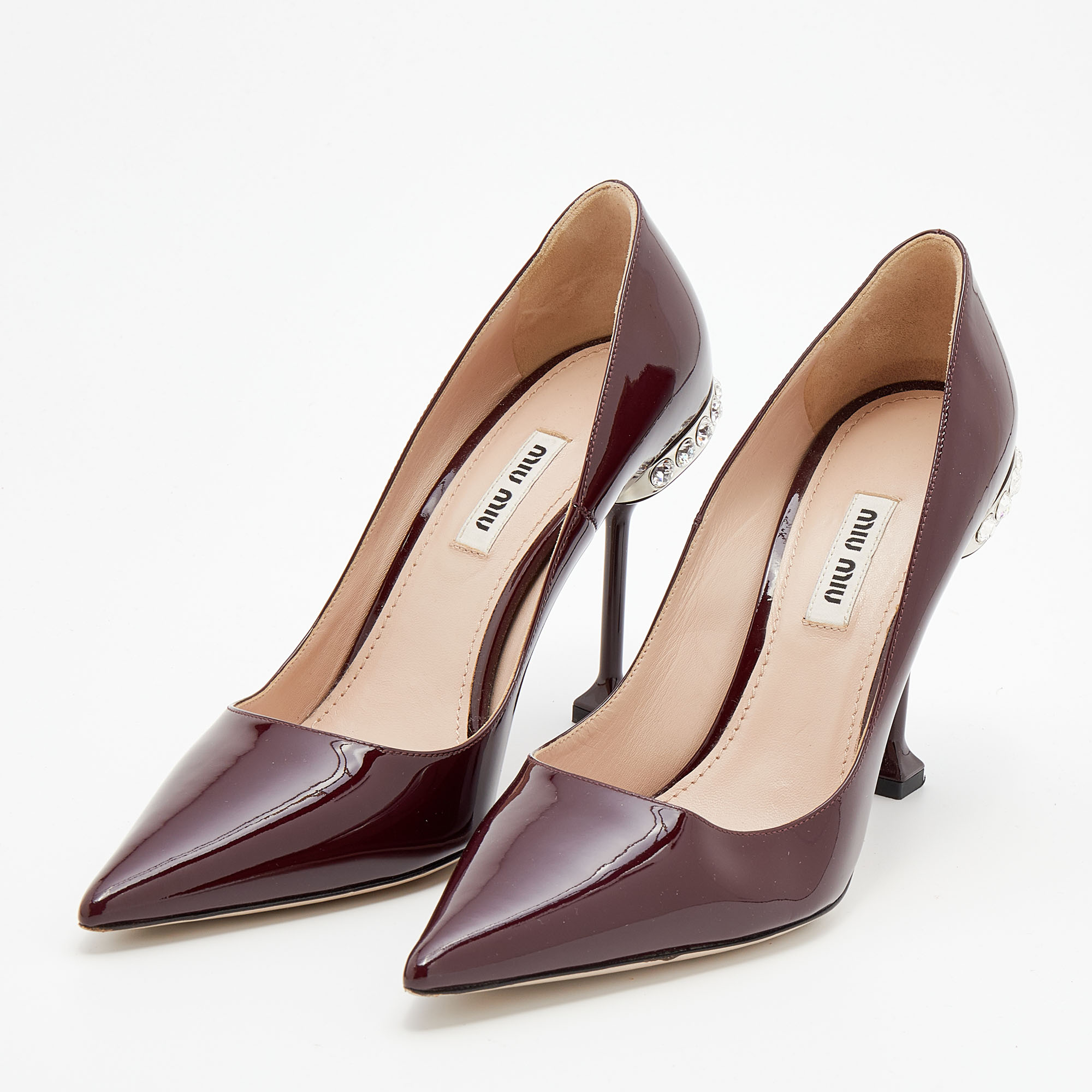 

Miu Miu Burgundy Patent Leather Crystal Embellished Heel Pointed Toe Pumps Size