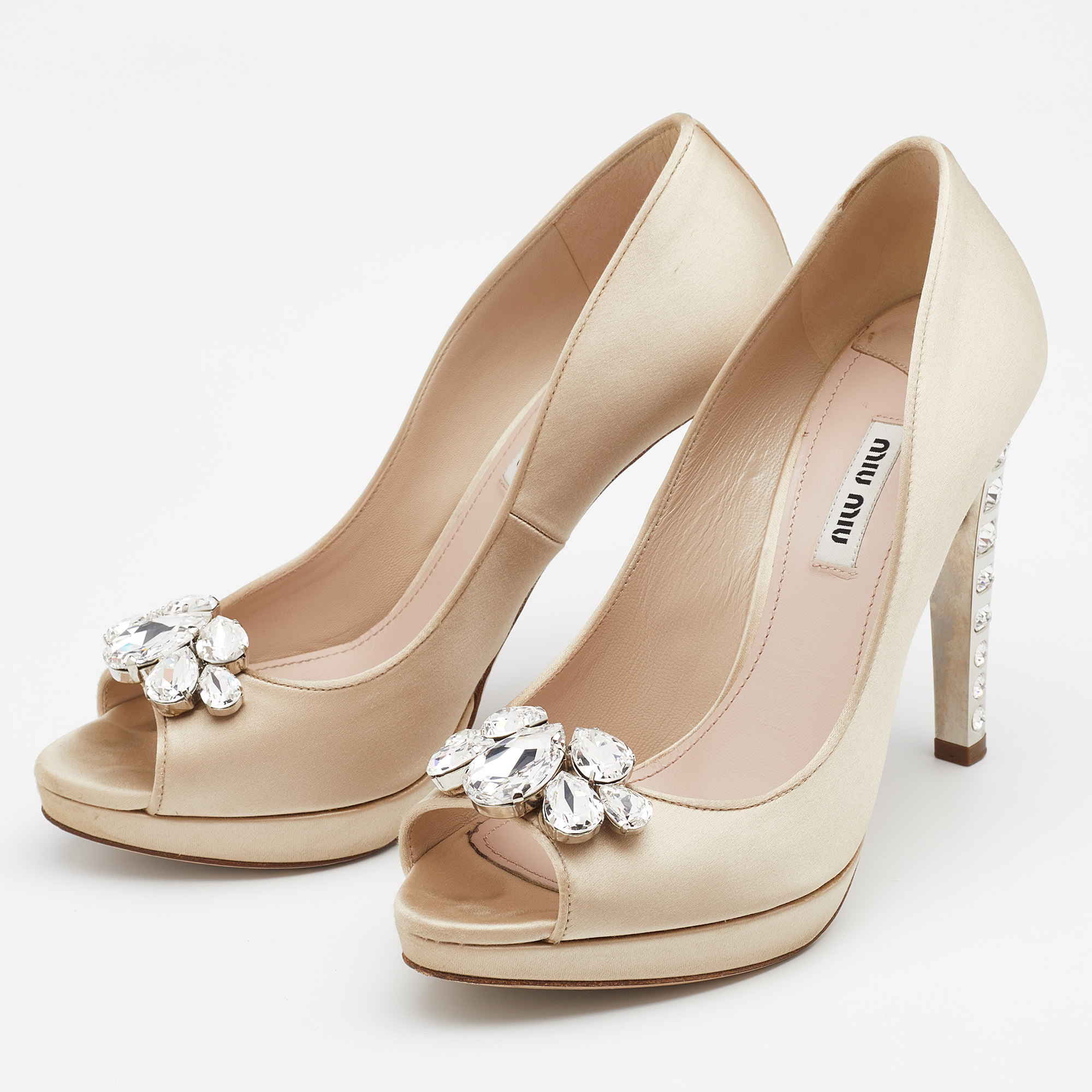 

Miu Miu Beige Satin Embellished Peep Toe Pumps Size
