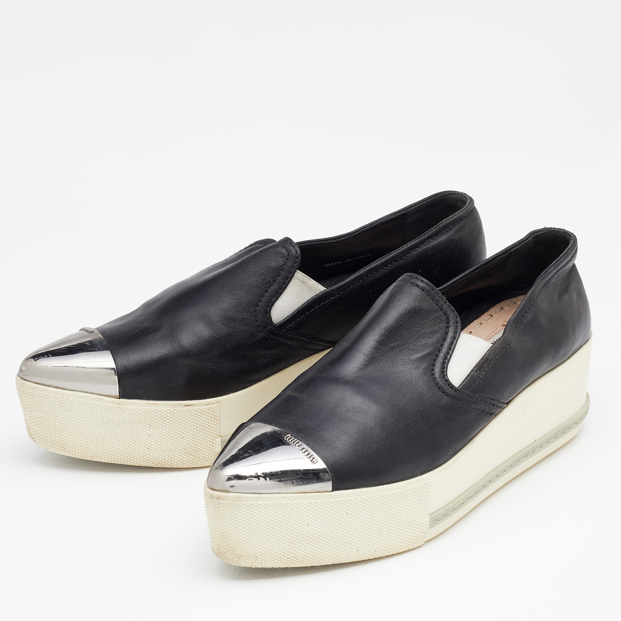 

Miu Miu Black Leather Metal Cap Toe Platform Slip On Sneakers Size