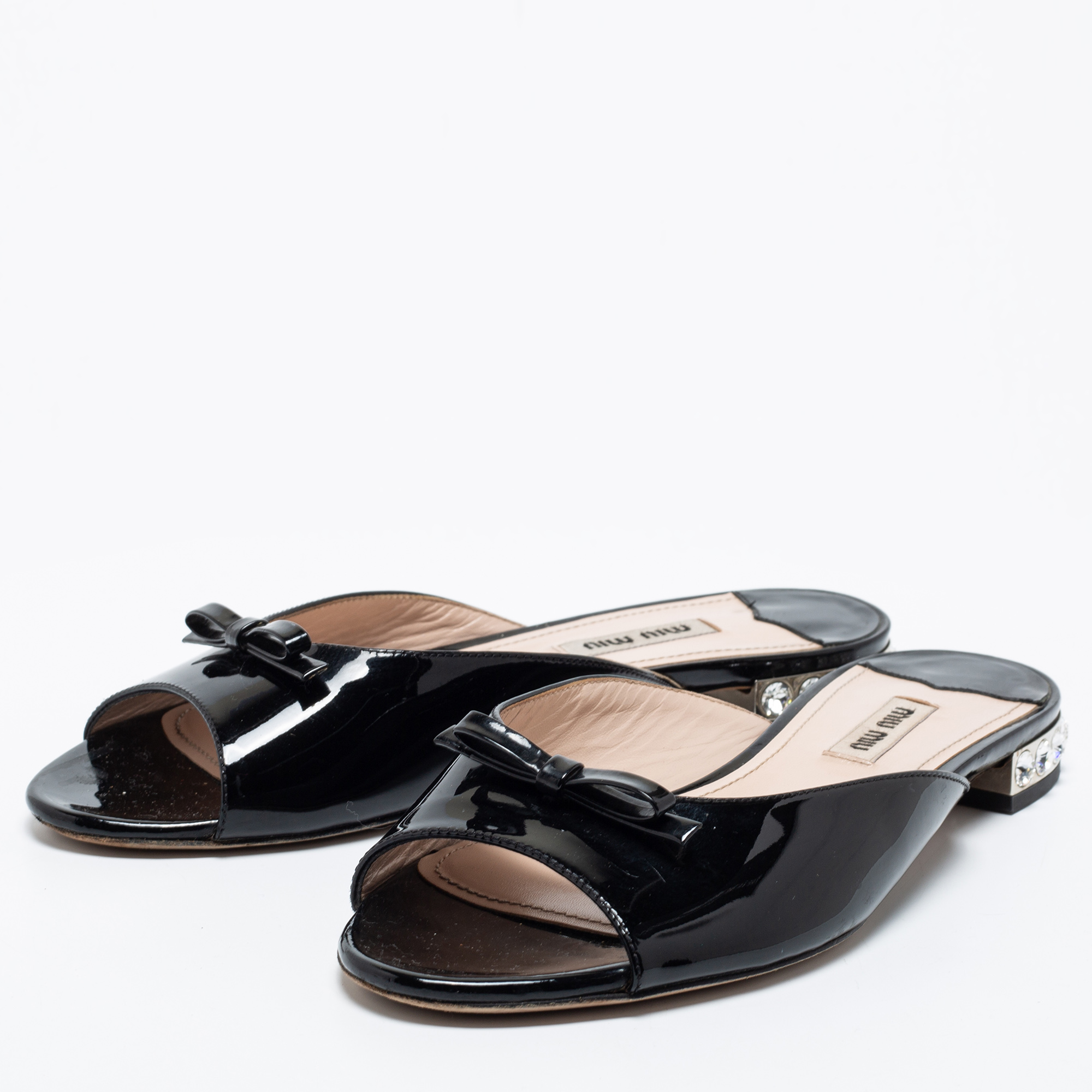 

Miu Miu Black Patent Leather Bow Embellished Slides Size