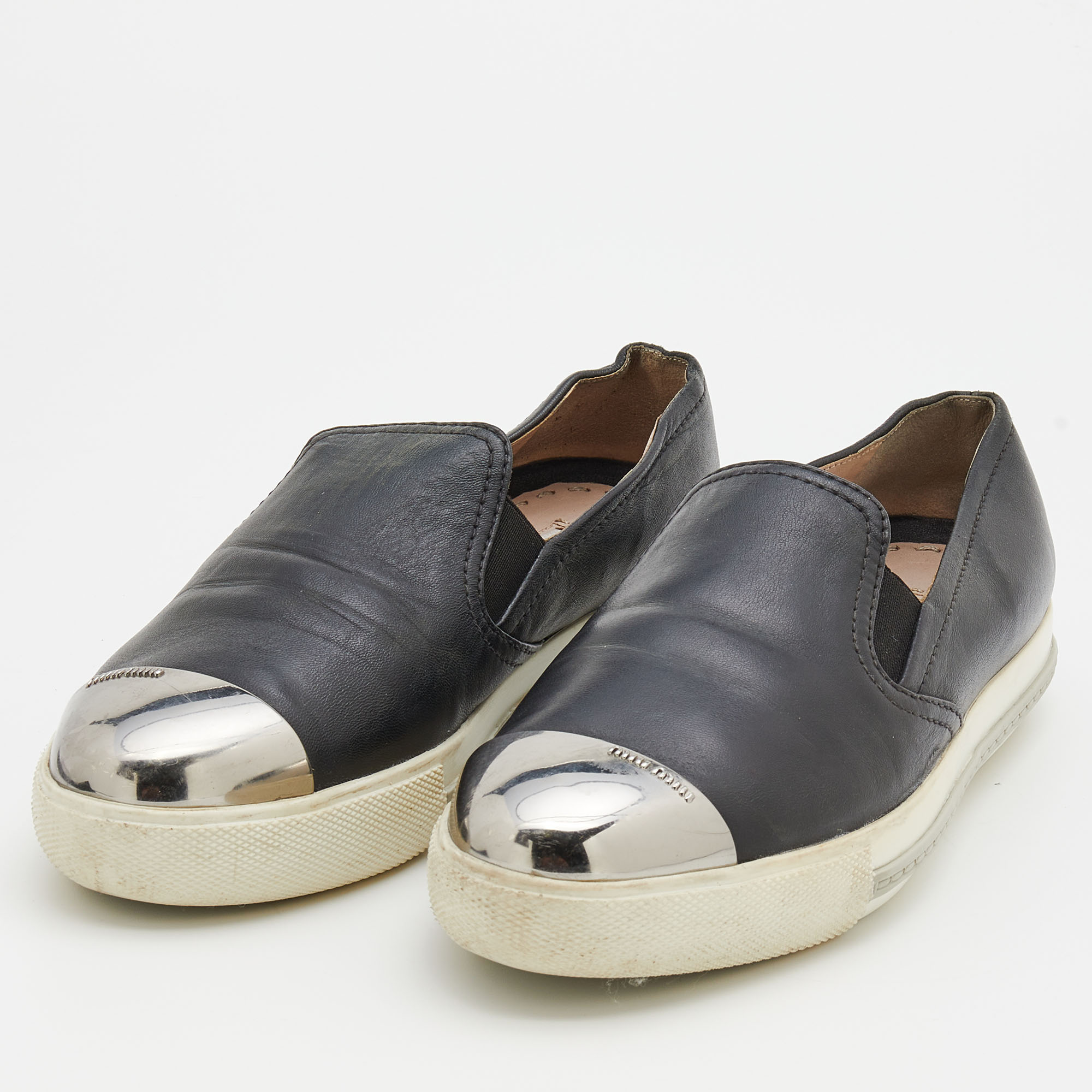 

Miu Miu Black Leather Metal Cap Toe Slip On Sneakers Size