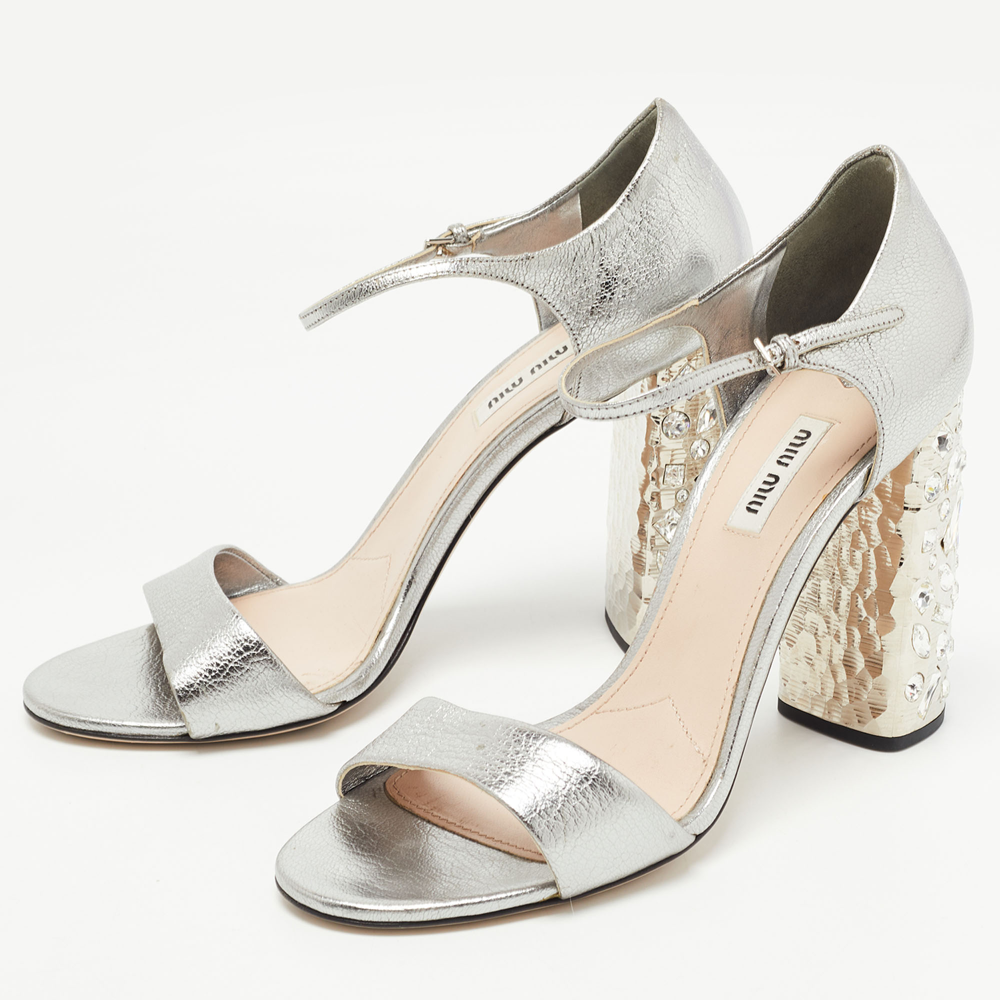 

Miu Miu Silver Leather Crystal Embellished Heel Ankle Strap Sandals Size