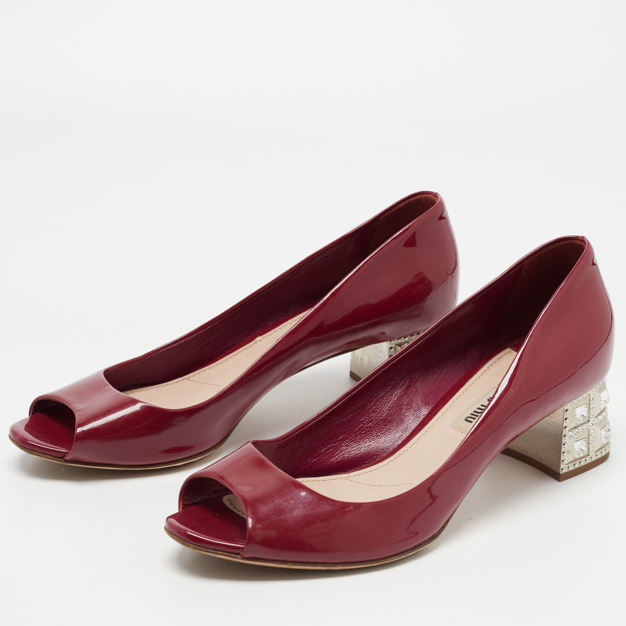 

Miu Miu Burgundy Patent Leather Peep Toe Embellished Block Heel Pumps Size
