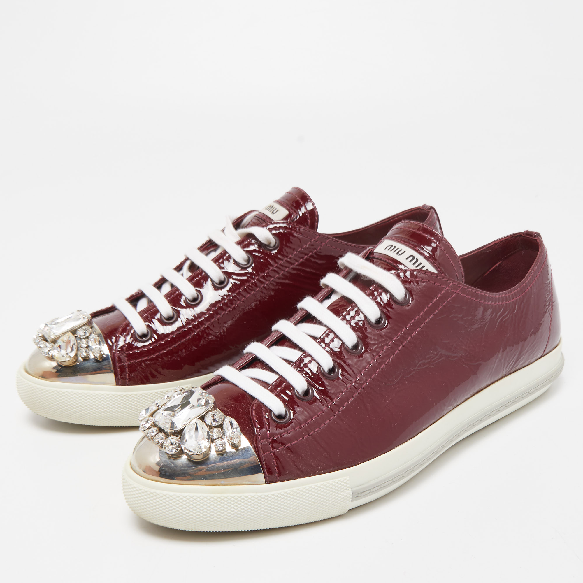 

Miu Miu Burgundy Patent Leather Crystal Cap Toe Sneakers Size