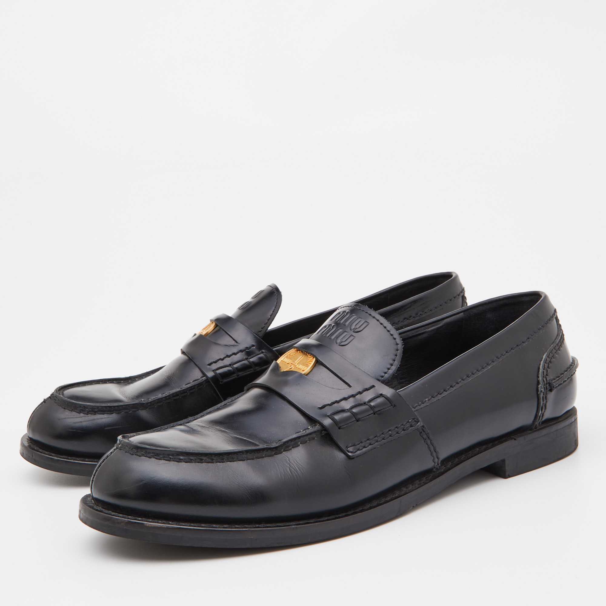 

Miu Miu Black Leather Coin Penny Loafers Size