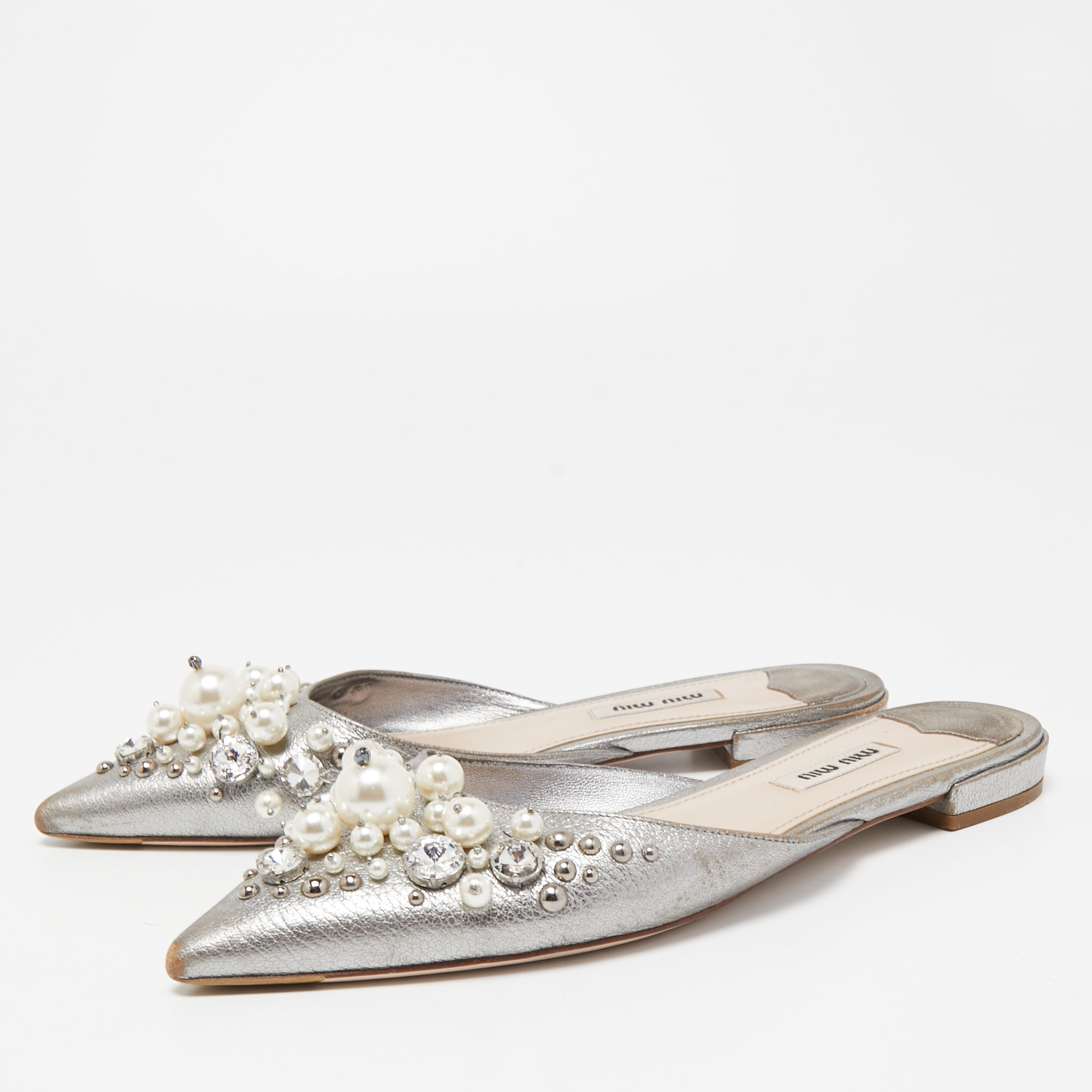 

Miu Miu Grey Leather Embellished Flat Mules Size