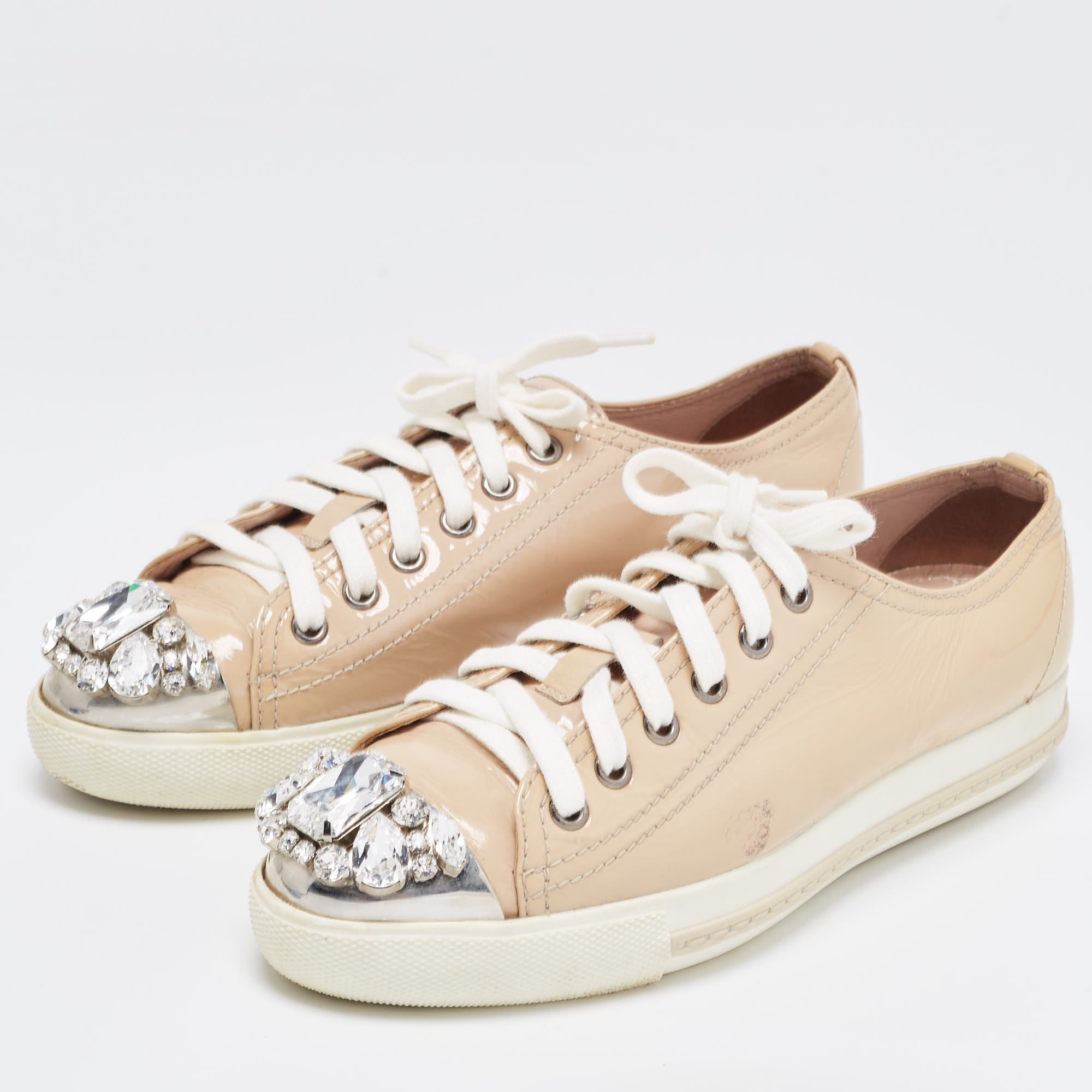 

Miu Miu Beige Patent Leather Crystal Embellished Cap Toe Low Top Sneakers Size