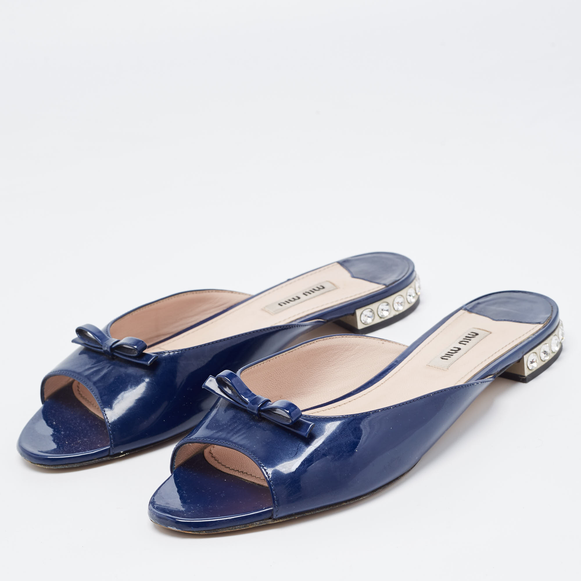 

Miu Miu Navy Blue Patent Leather Bow Detail Jeweled Heel Flat Slides Size