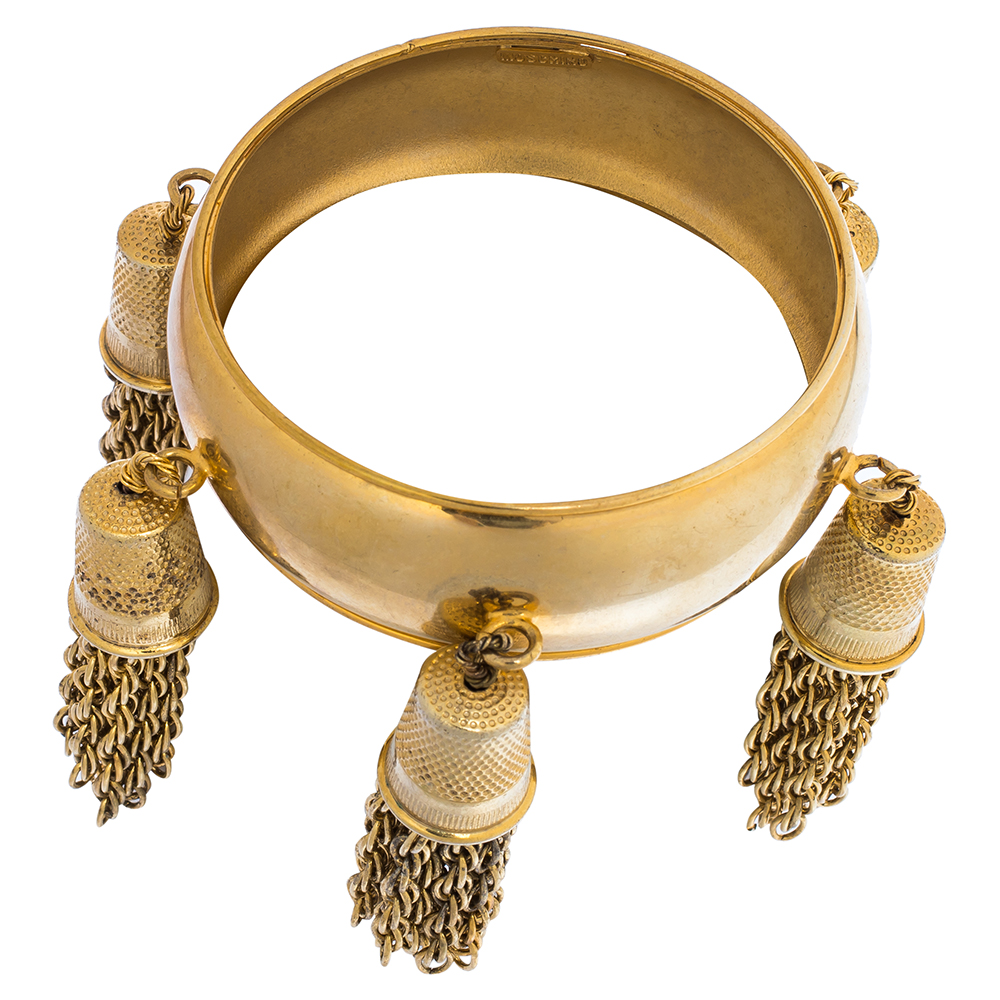 

Moschino Gold Tone Tasseled Thimble Bangle Bracelet