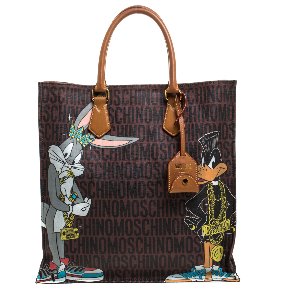 Click to view more detailed imagery on our partner's website Pre-owned Moschino Brown Bugs Bunny And Duffy Duck Printed Shopper Tote